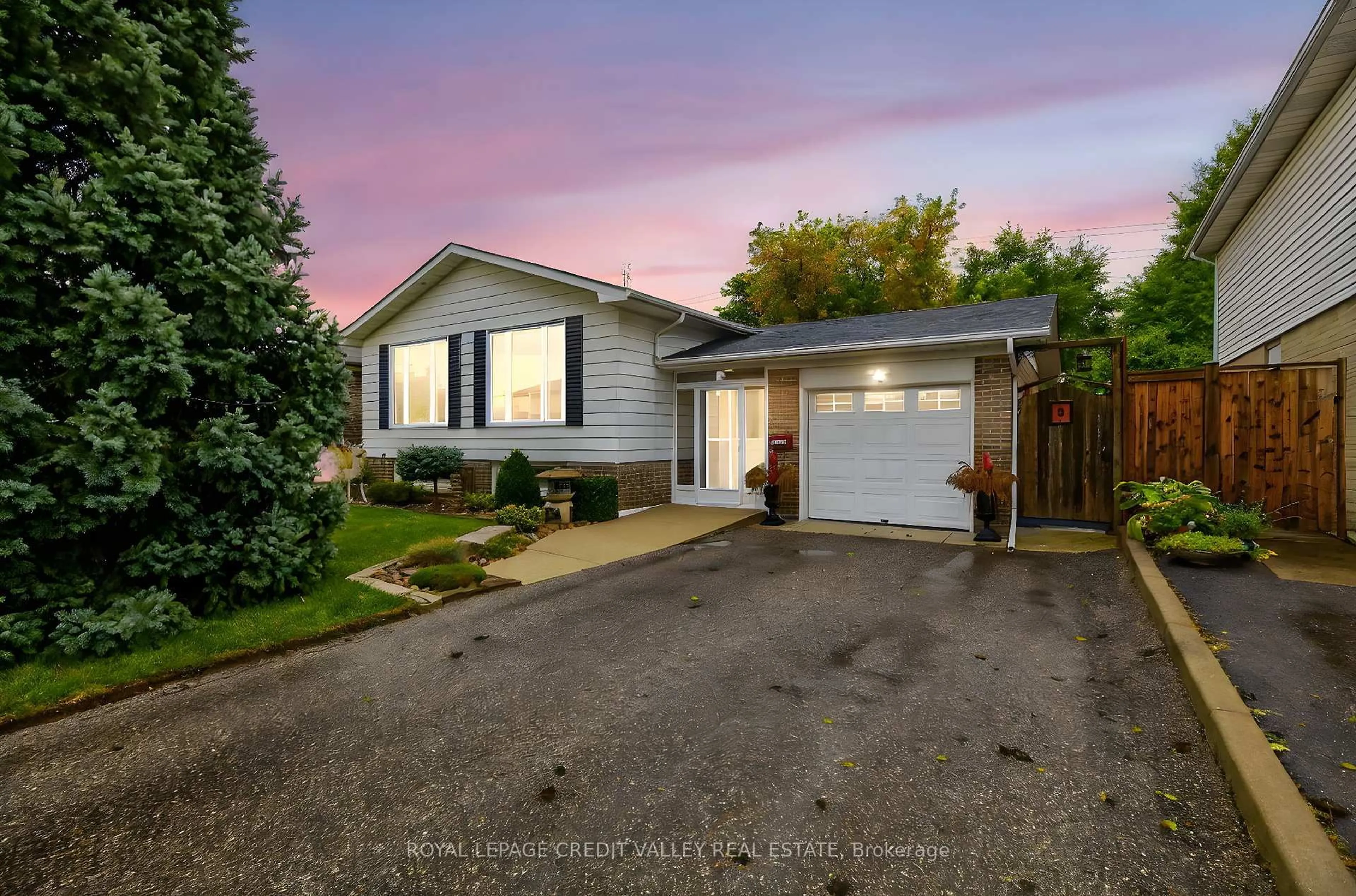 Home with vinyl exterior material, street for 23 Caldwell Cres, Brampton Ontario L6W 1A2
