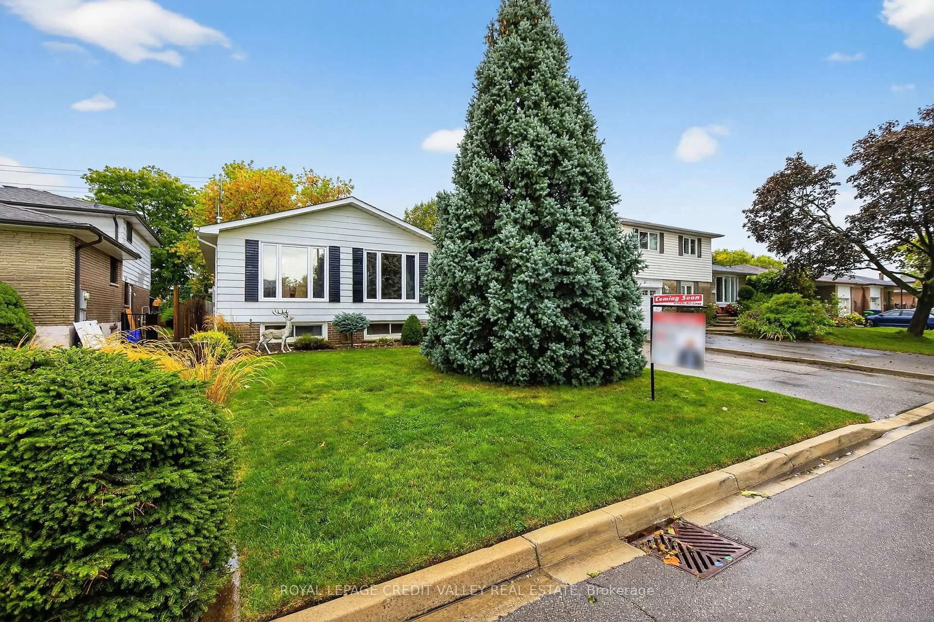 Home with vinyl exterior material, street for 23 Caldwell Cres, Brampton Ontario L6W 1A2