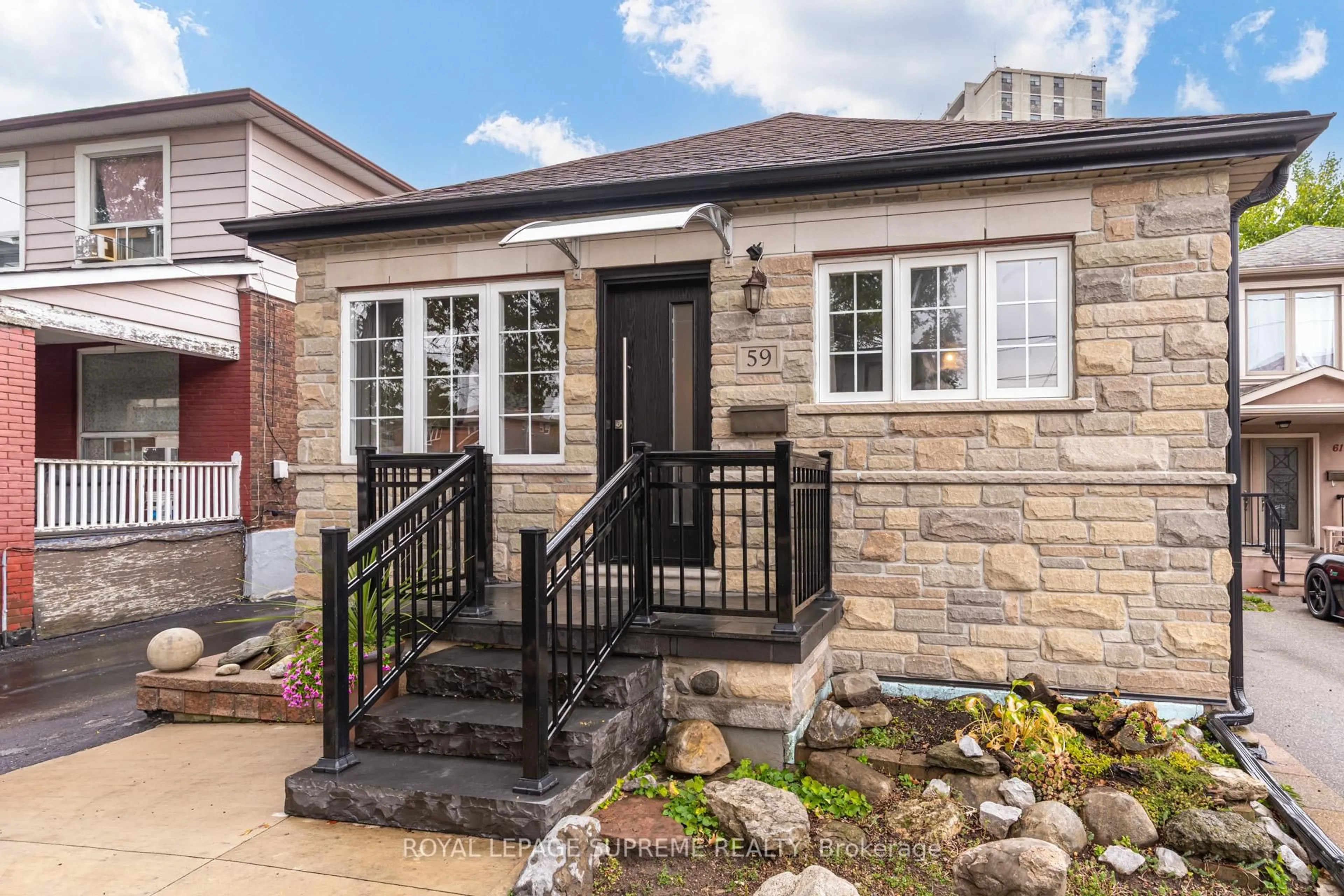 Home with brick exterior material, street for 59 Buttonwood Ave, Toronto Ontario M6M 2H9