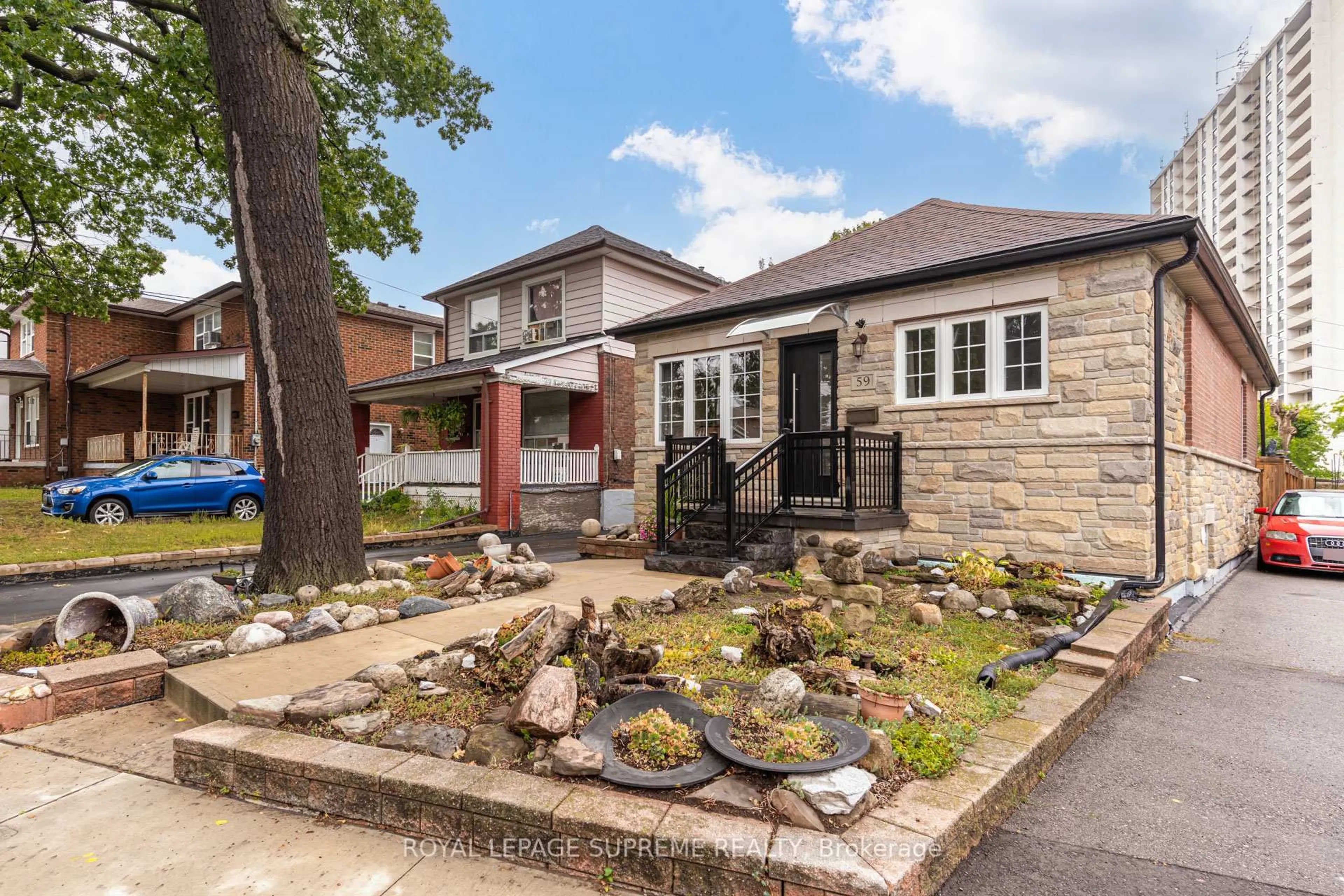 Home with brick exterior material, street for 59 Buttonwood Ave, Toronto Ontario M6M 2H9