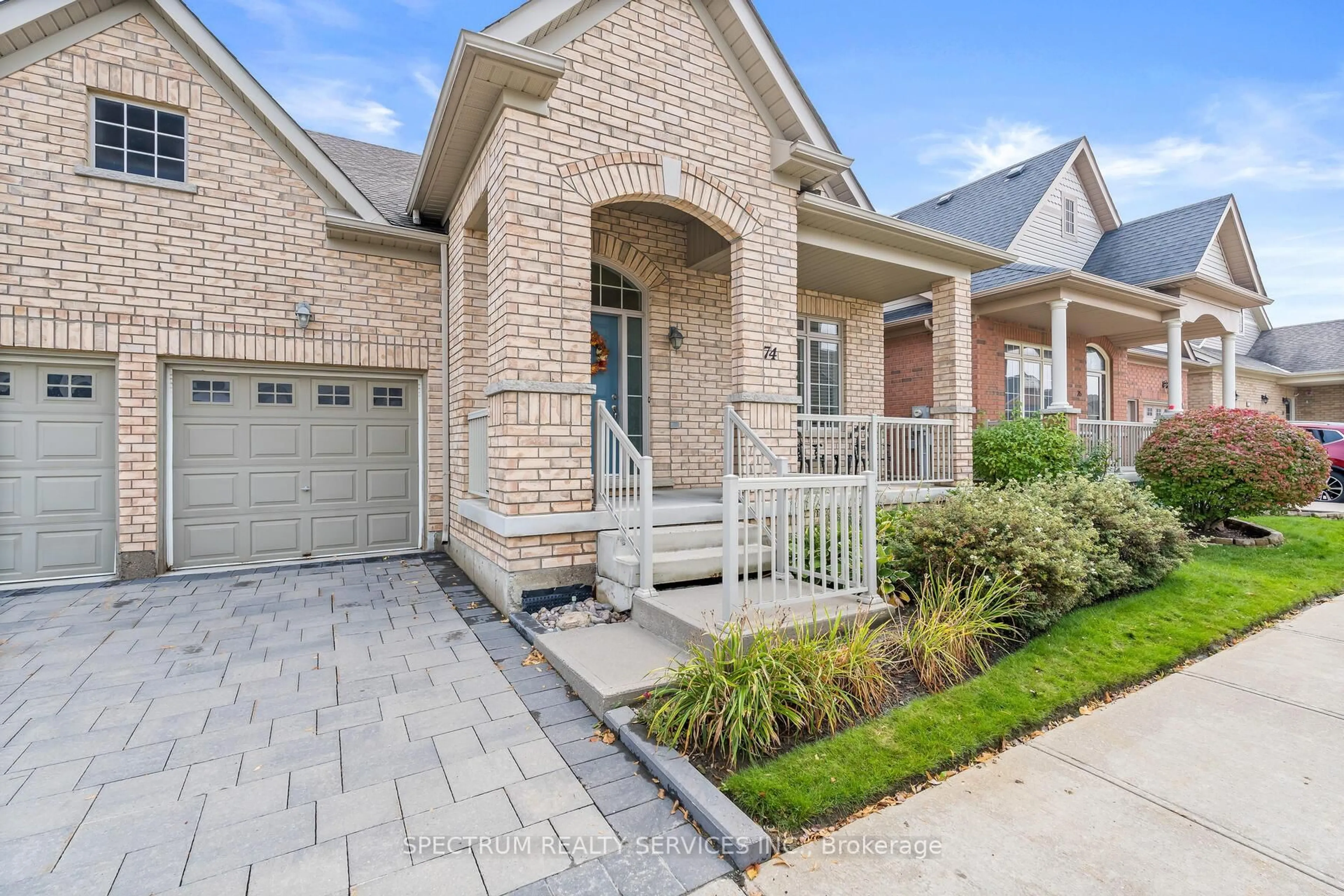 Home with brick exterior material, street for 74 Locust Dr, Brampton Ontario L6R 0Y8