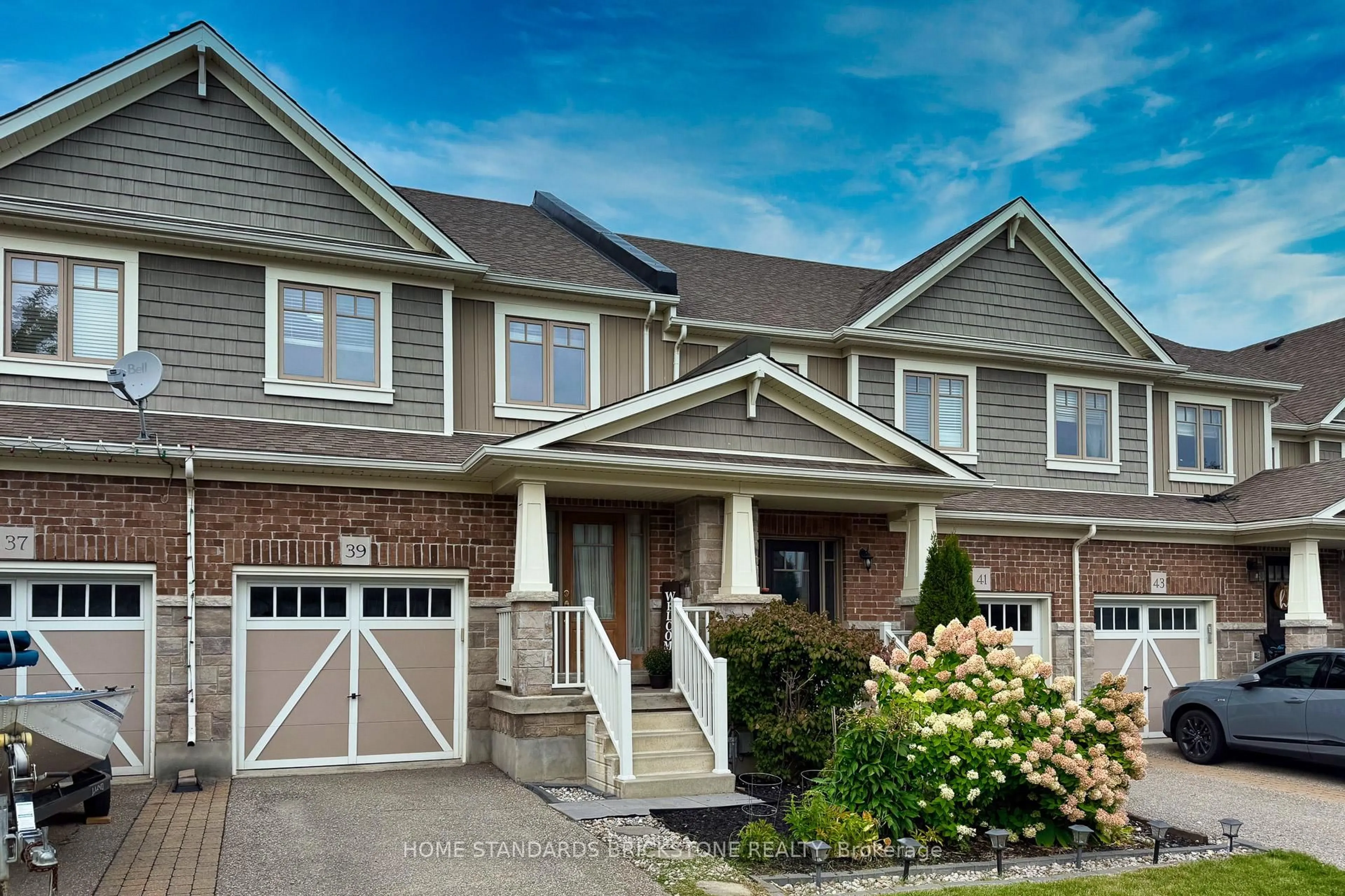 Home with brick exterior material, street for 39 Laverty Cres, Orangeville Ontario L9W 6S9
