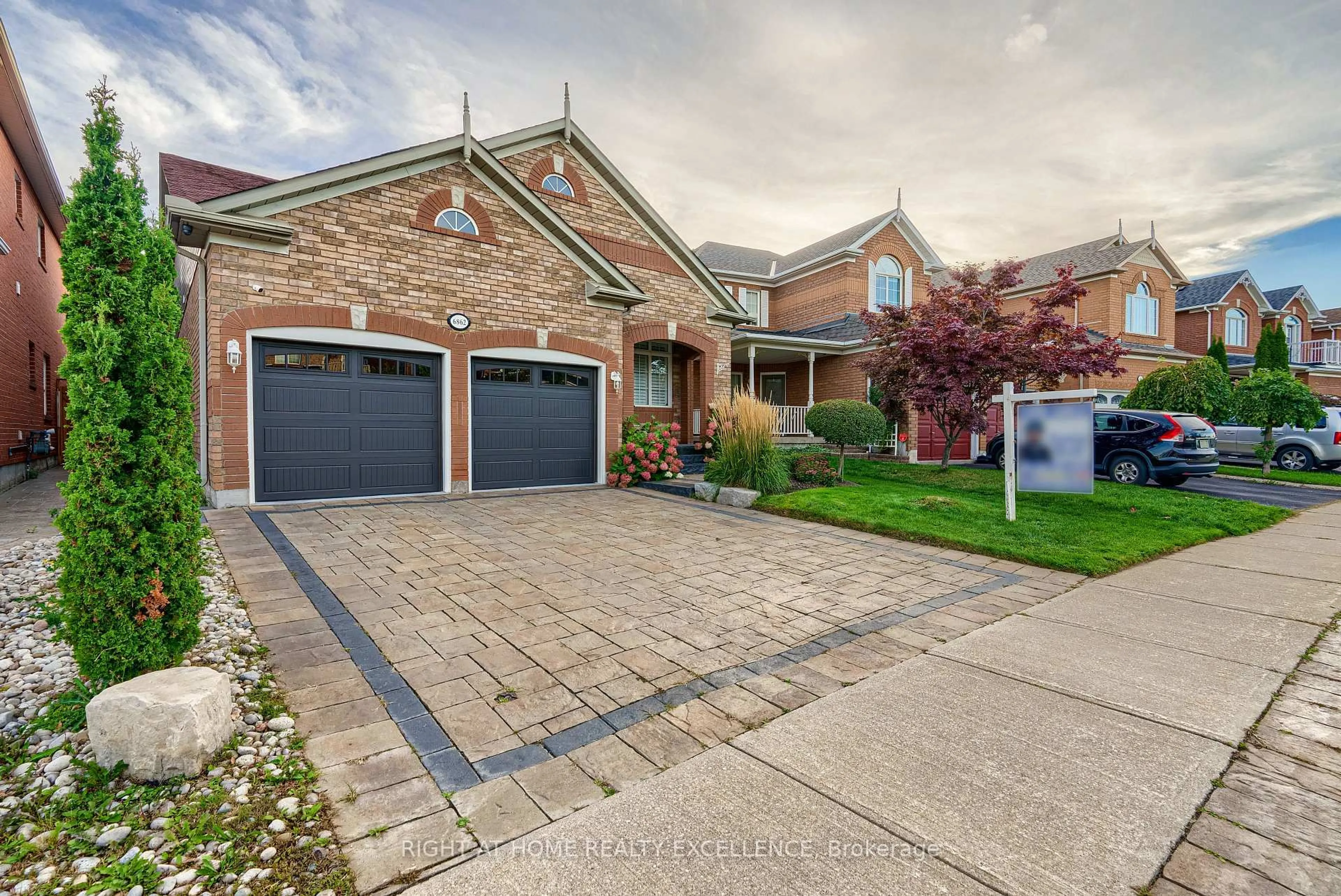 Home with brick exterior material, street for 6862 Gooderham Estate Blvd, Mississauga Ontario L5W 1B1