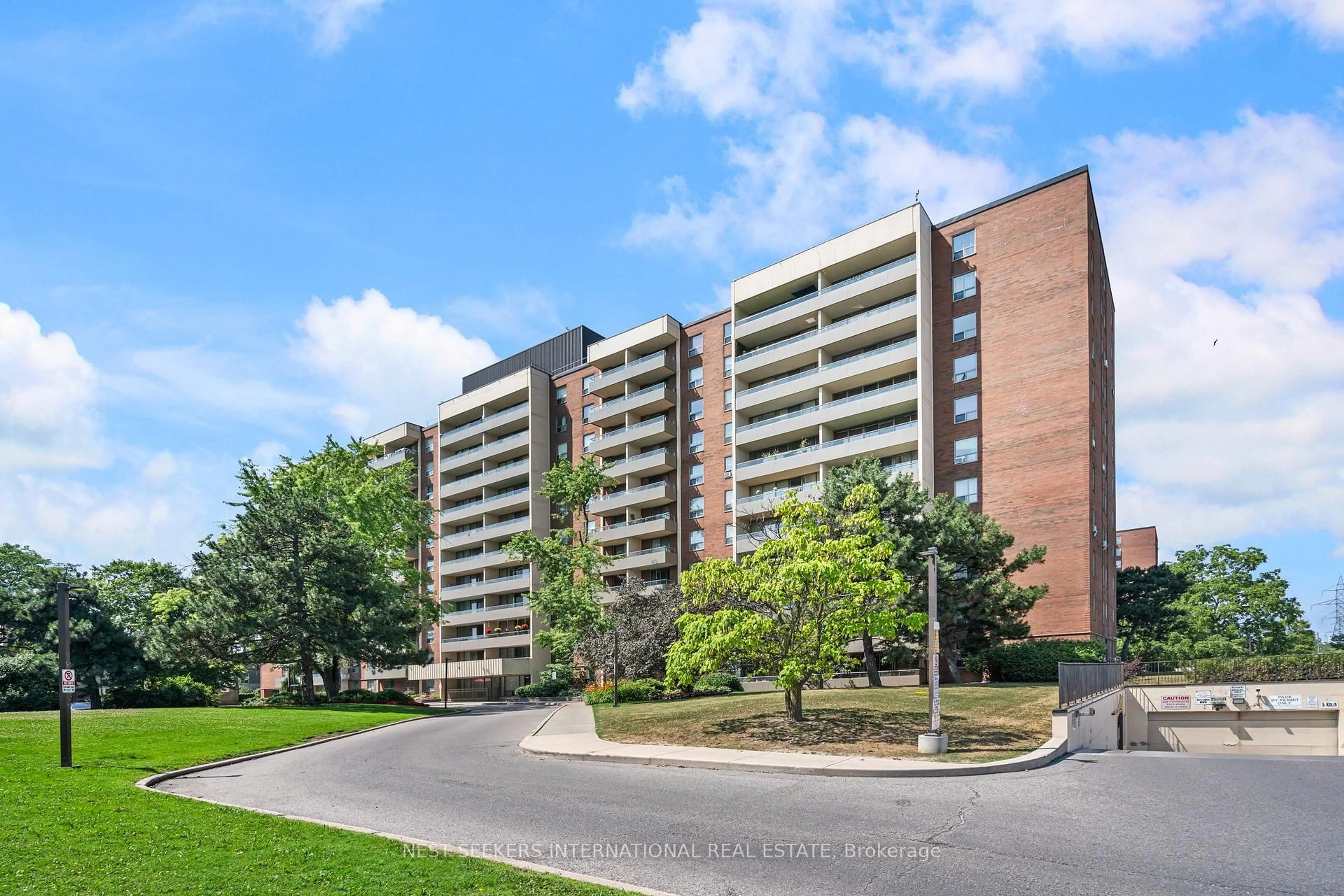 A pic from outside/outdoor area/front of a property/back of a property/a pic from drone, building for 9 Four Winds Dr #1004, Toronto Ontario M3J 2S8