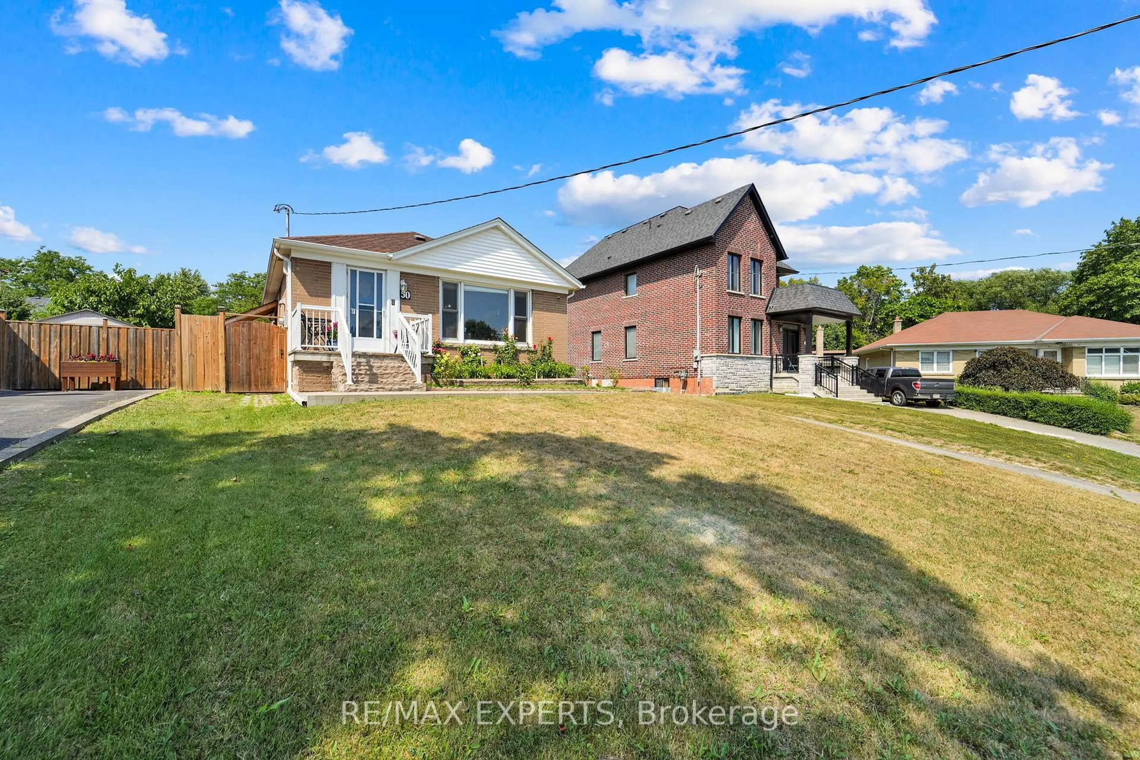 A pic from outside/outdoor area/front of a property/back of a property/a pic from drone, street for 50 Datchet Rd, Toronto Ontario M3M 1X6