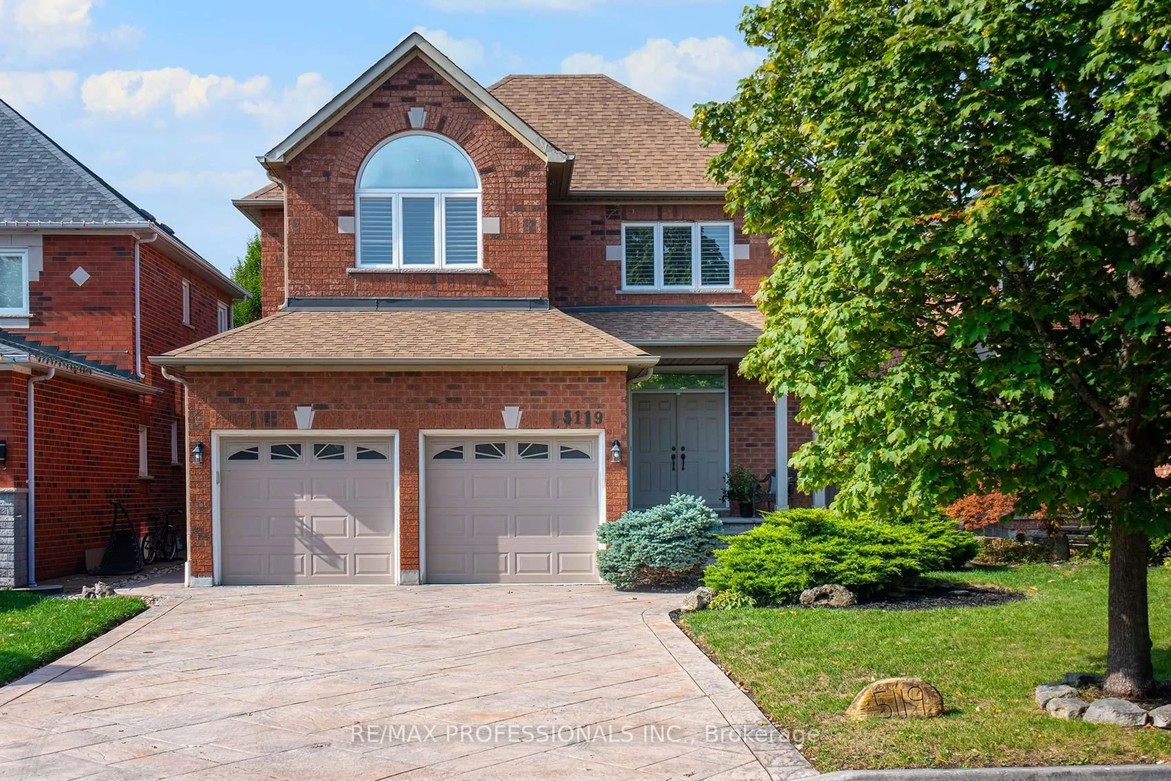 Home with brick exterior material, street for 5119 Forestwalk Circ, Mississauga Ontario L4Z 4A2