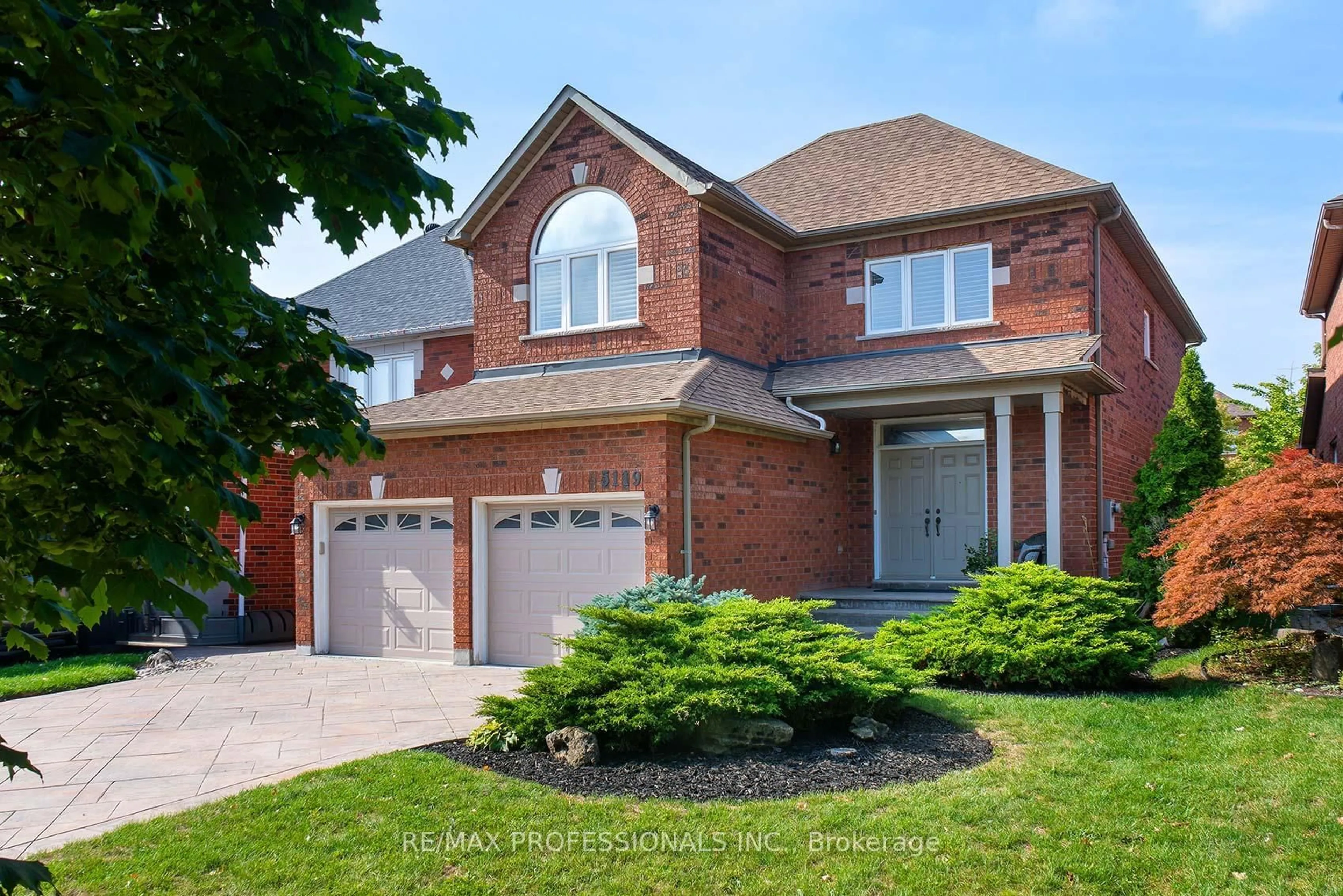 Home with brick exterior material, street for 5119 Forestwalk Circ, Mississauga Ontario L4Z 4A2