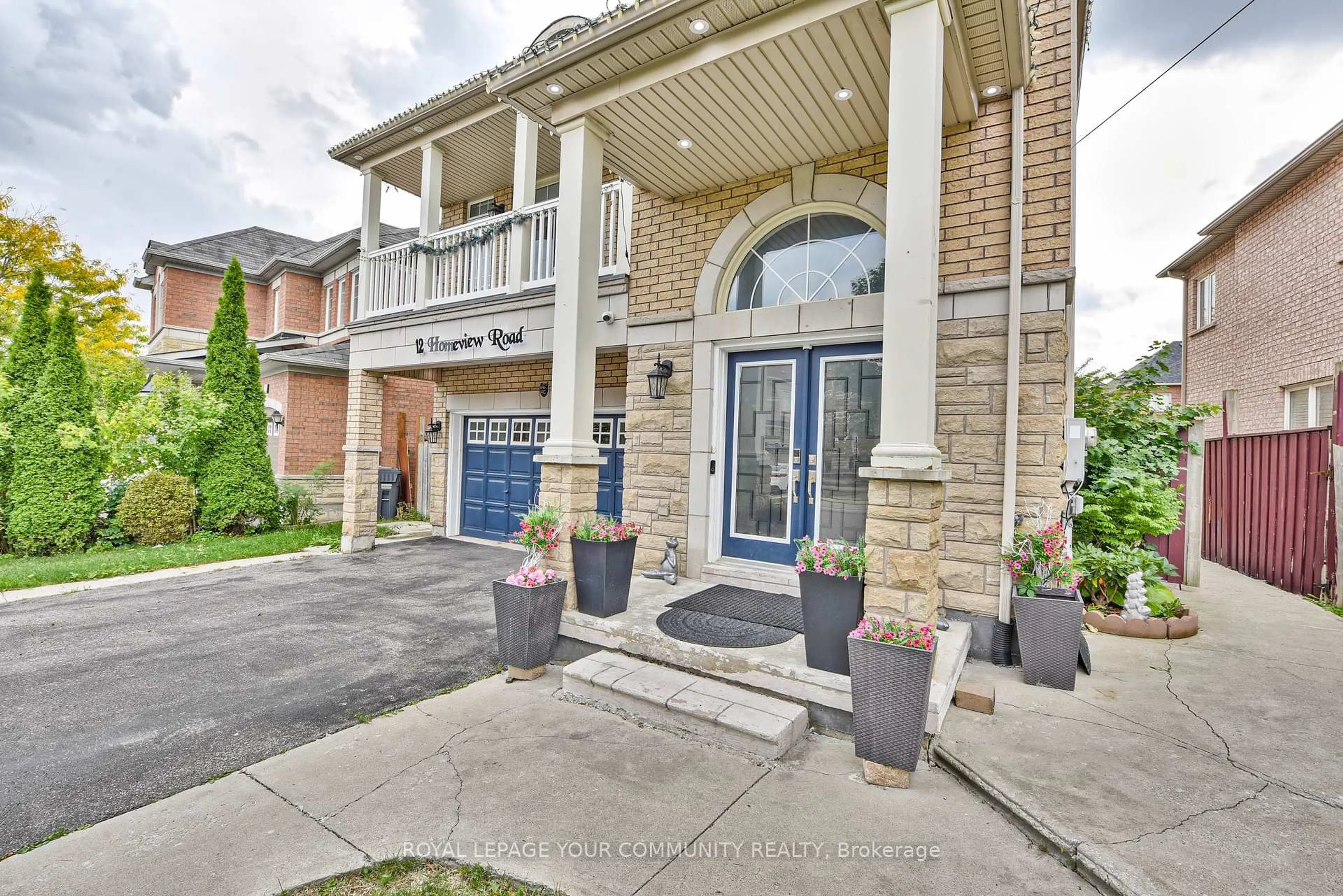 Home with brick exterior material, street for 12 Homeview Rd, Brampton Ontario L6P 2L9