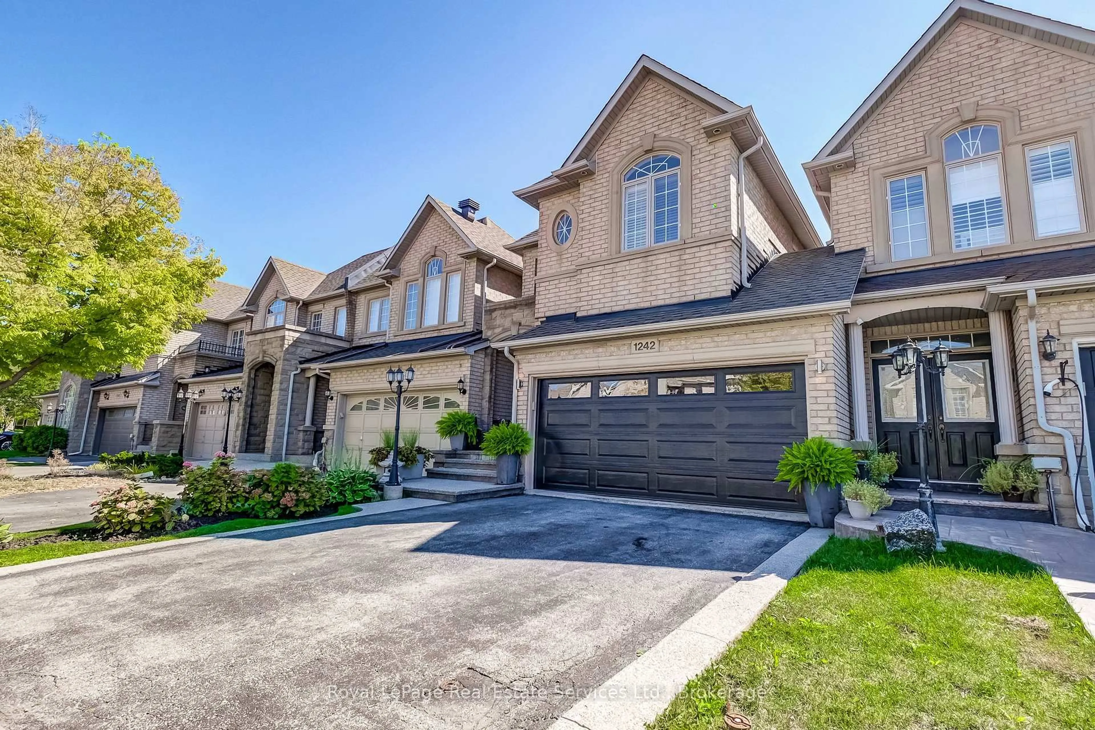 Home with brick exterior material, street for 1242 Agram Dr, Oakville Ontario L6H 7N9