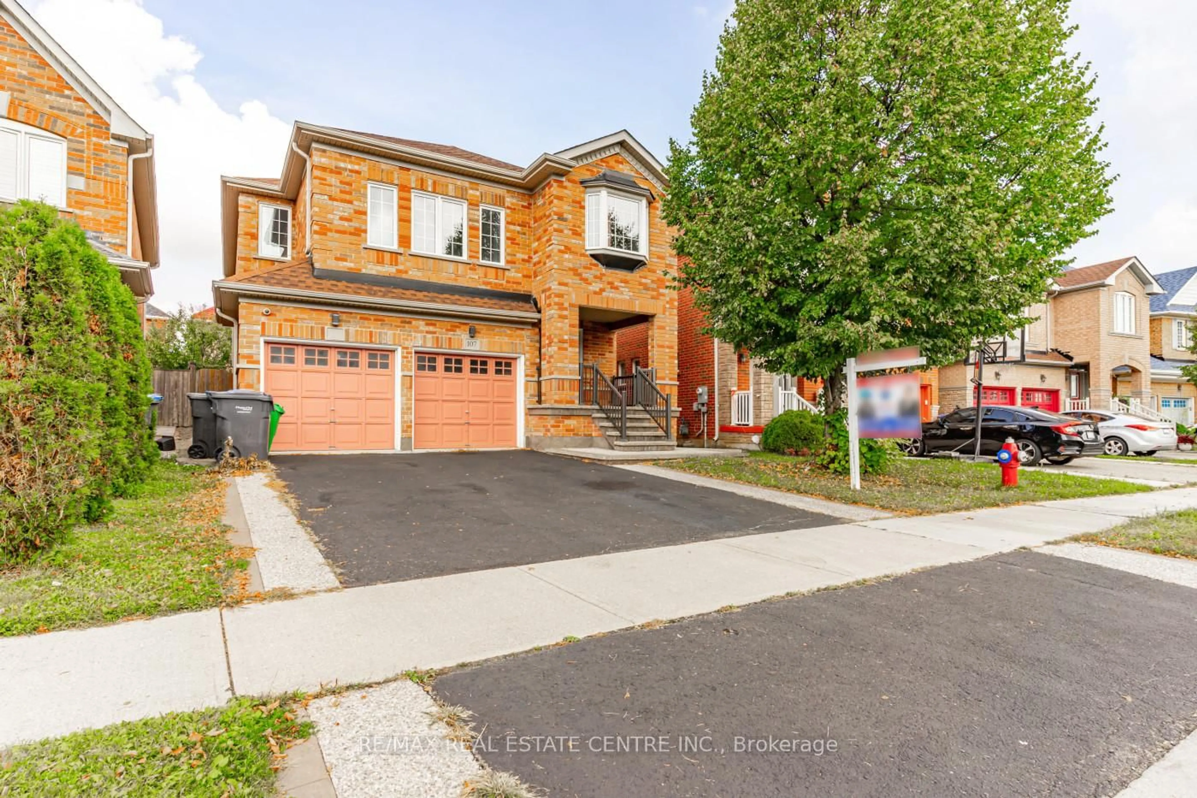 Home with brick exterior material, street for 107 Crown Victoria Dr, Brampton Ontario L7A 3X9