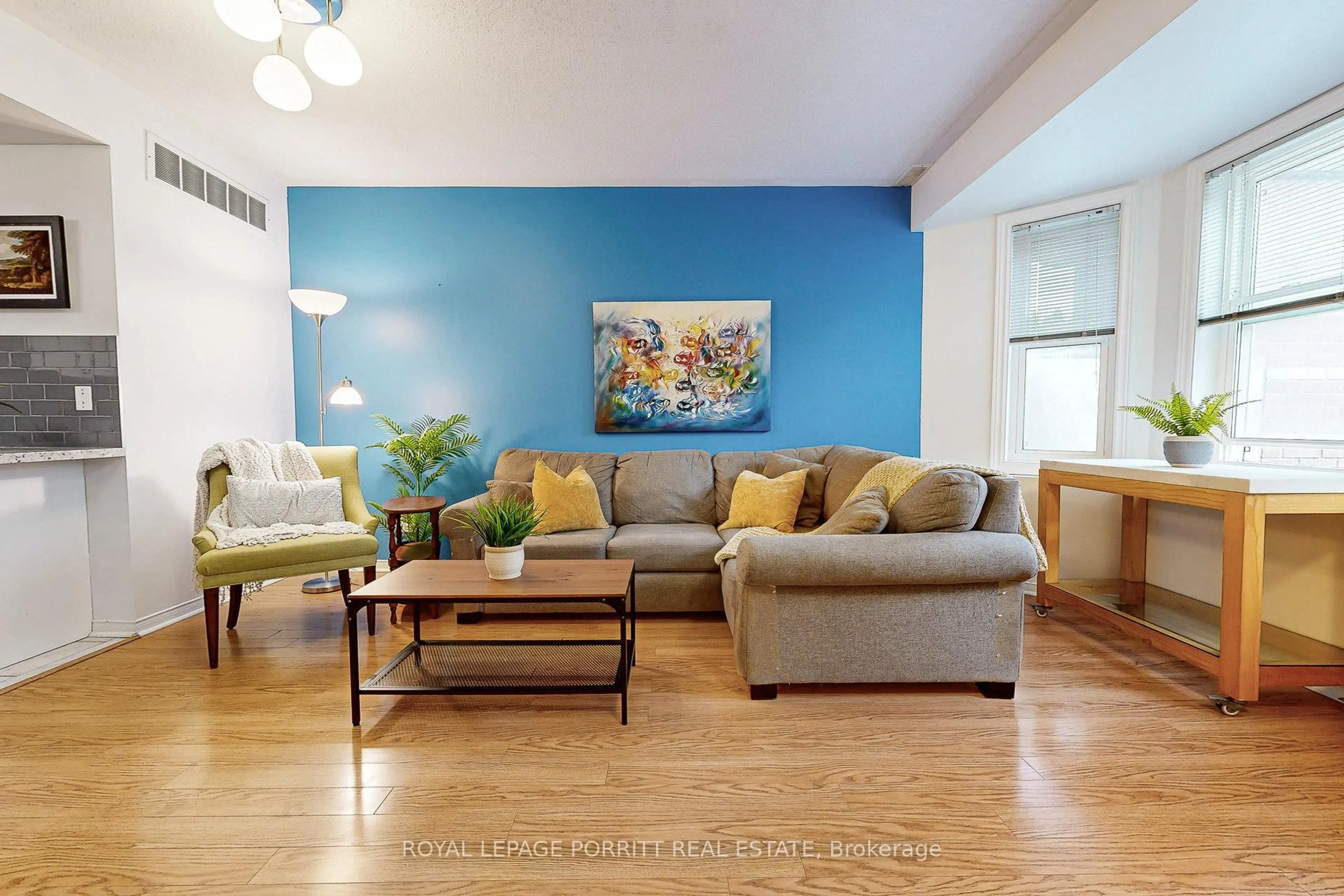 Living room with furniture, wood/laminate floor for 760 Lawrence Ave #174, Toronto Ontario M6A 3E7
