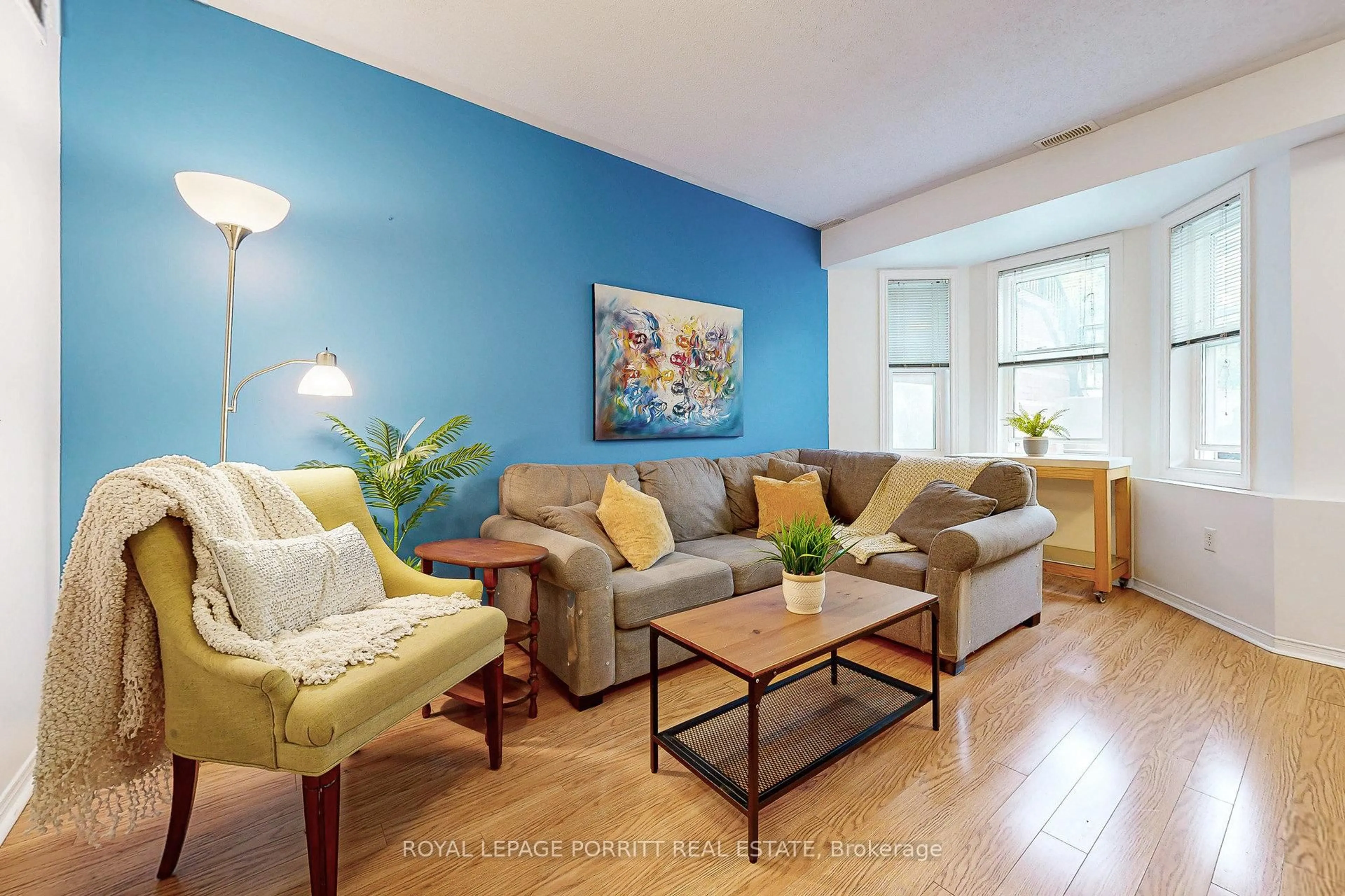 Living room with furniture, wood/laminate floor for 760 Lawrence Ave #174, Toronto Ontario M6A 3E7
