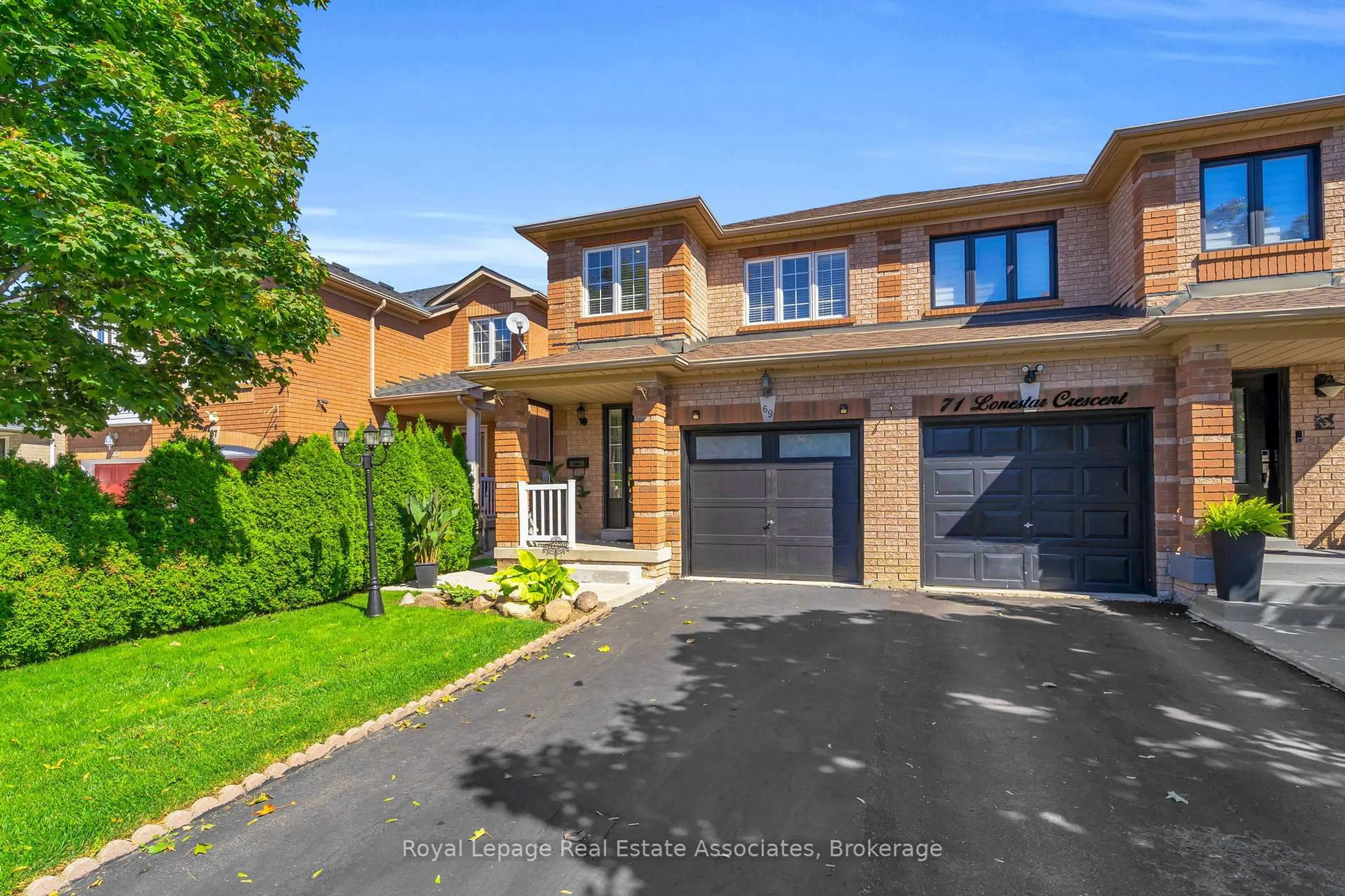 Home with brick exterior material, street for 69 Lonestar Cres, Brampton Ontario L7A 2J1