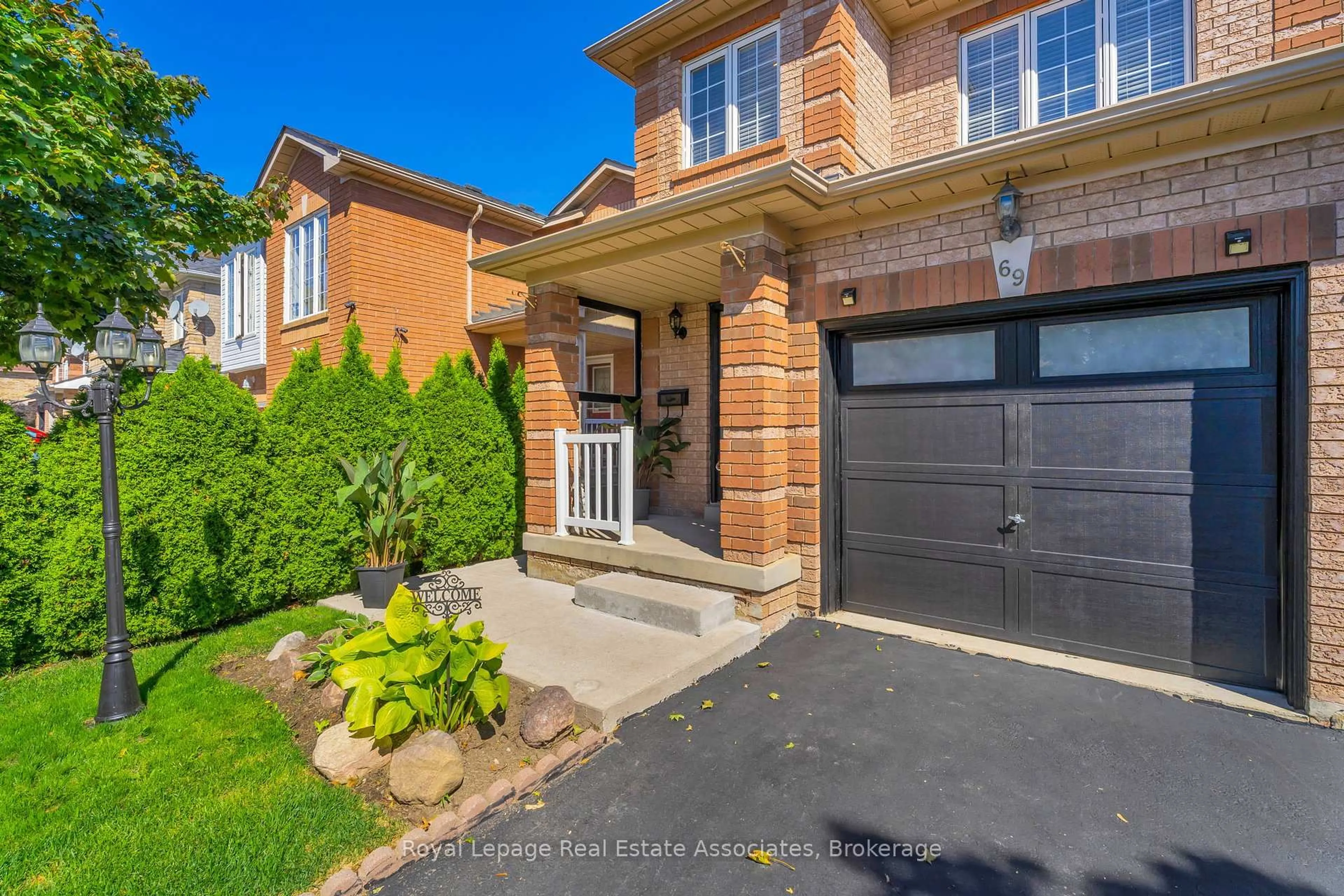 Home with brick exterior material, street for 69 Lonestar Cres, Brampton Ontario L7A 2J1
