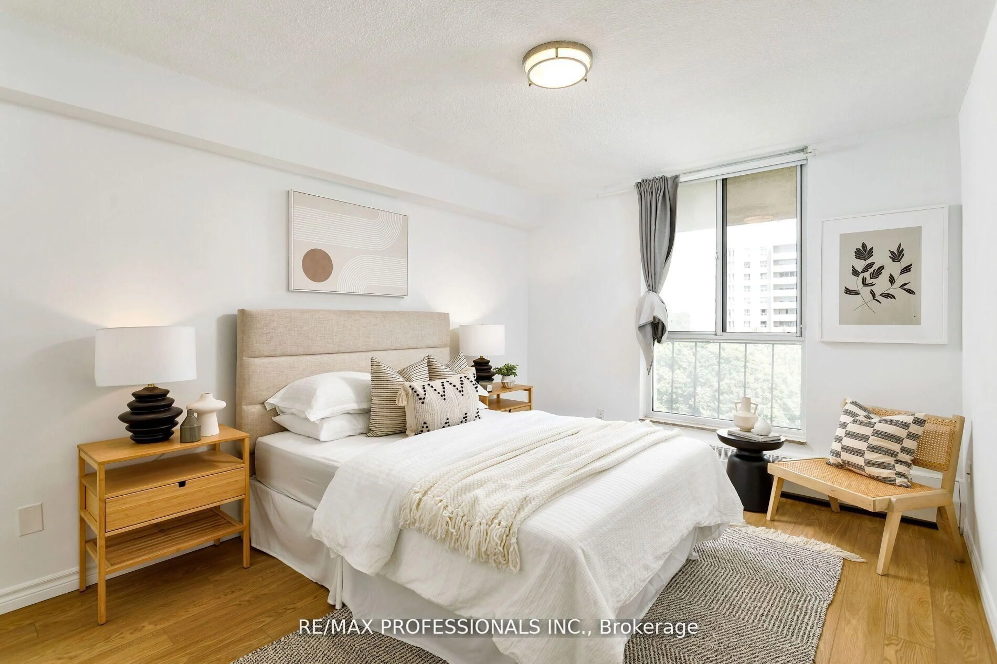 Bedroom with bed, wood/laminate floor for 35 Ormskirk Ave #510, Toronto Ontario M6S 1A8