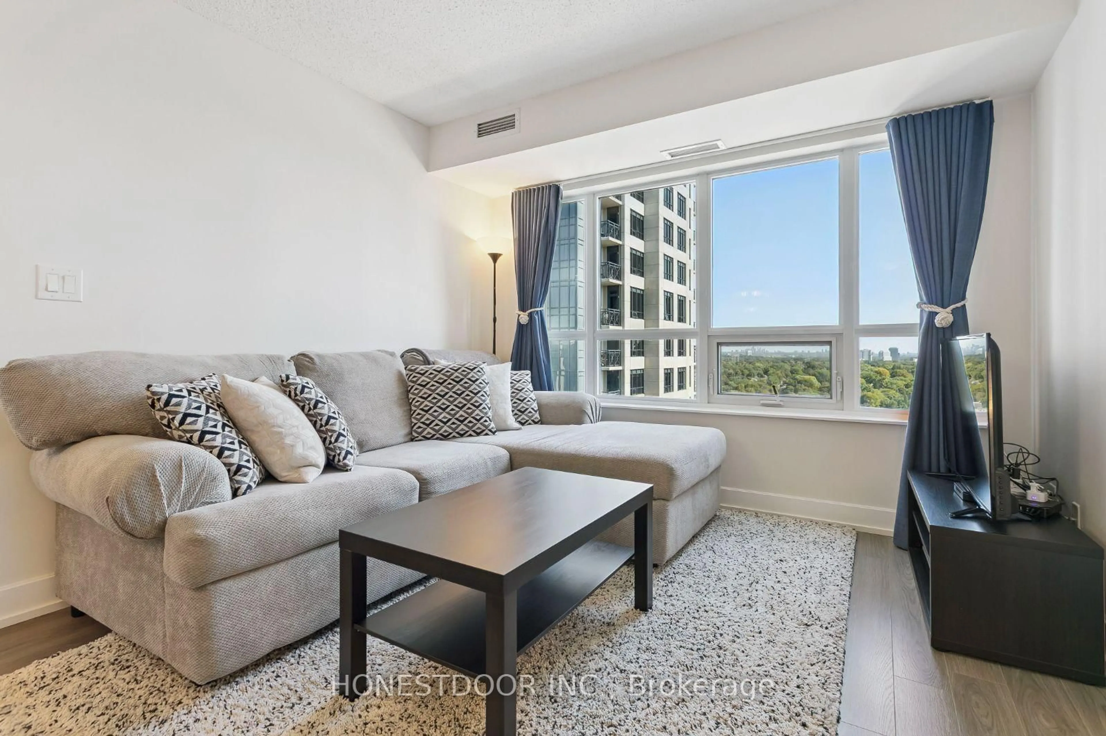 Living room with furniture, unknown for 6 Eva Rd #1503, Toronto Ontario M9C 0B1