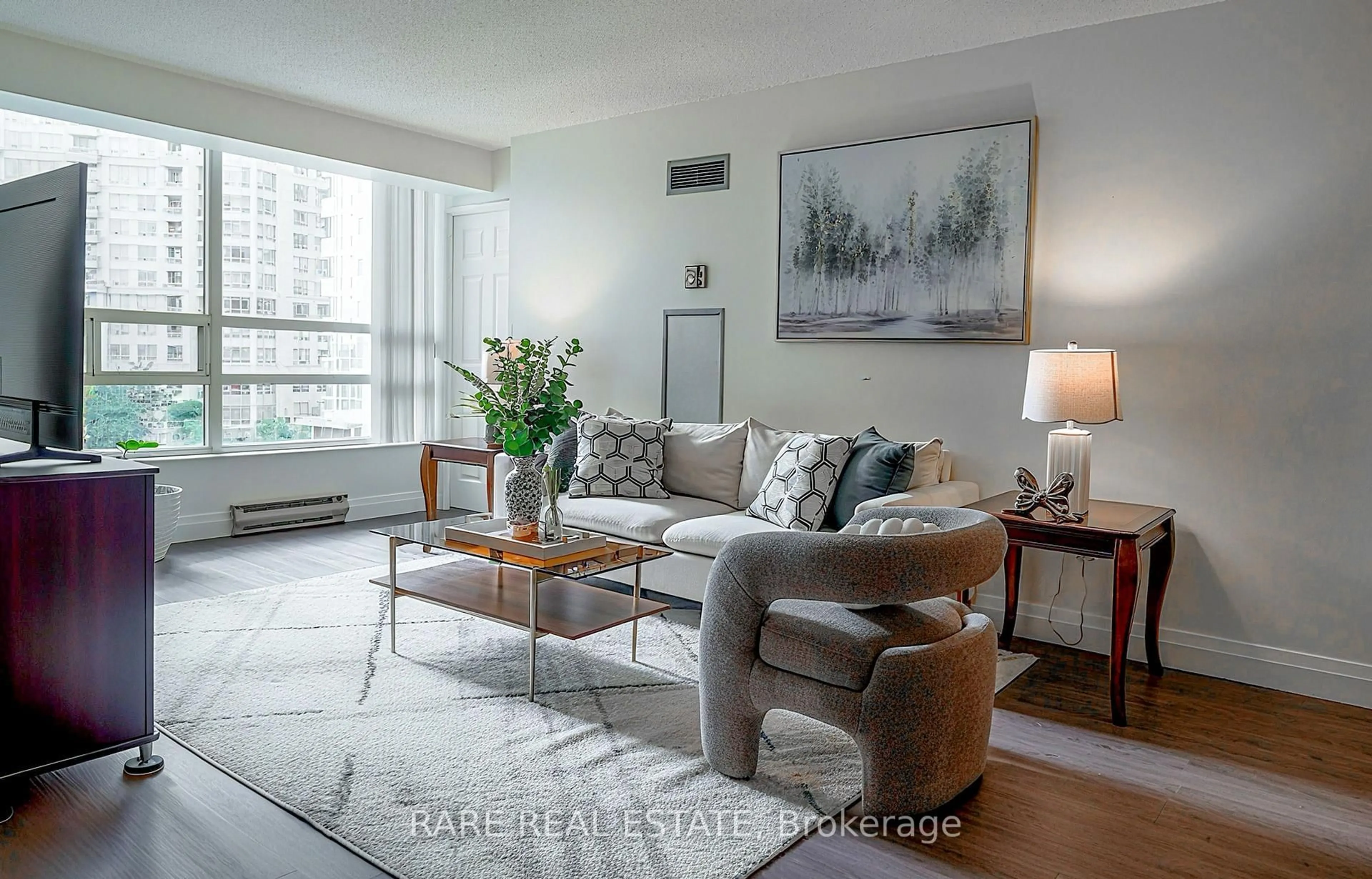 Living room with furniture, unknown for 250 Webb Dr #513, Mississauga Ontario L5B 3Z4