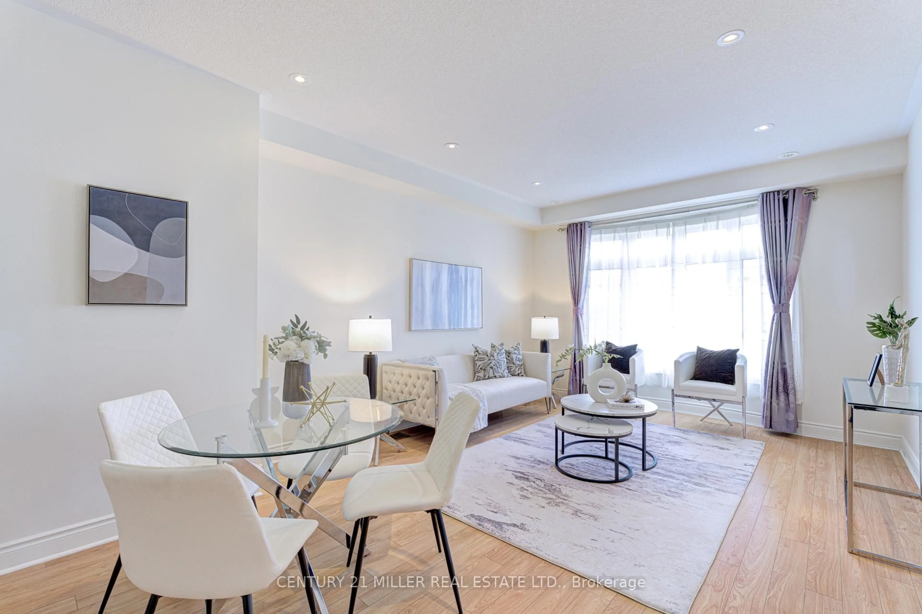 Living room with furniture, wood/laminate floor for 2419 Baronwood Dr, Oakville Ontario L6M 0J7