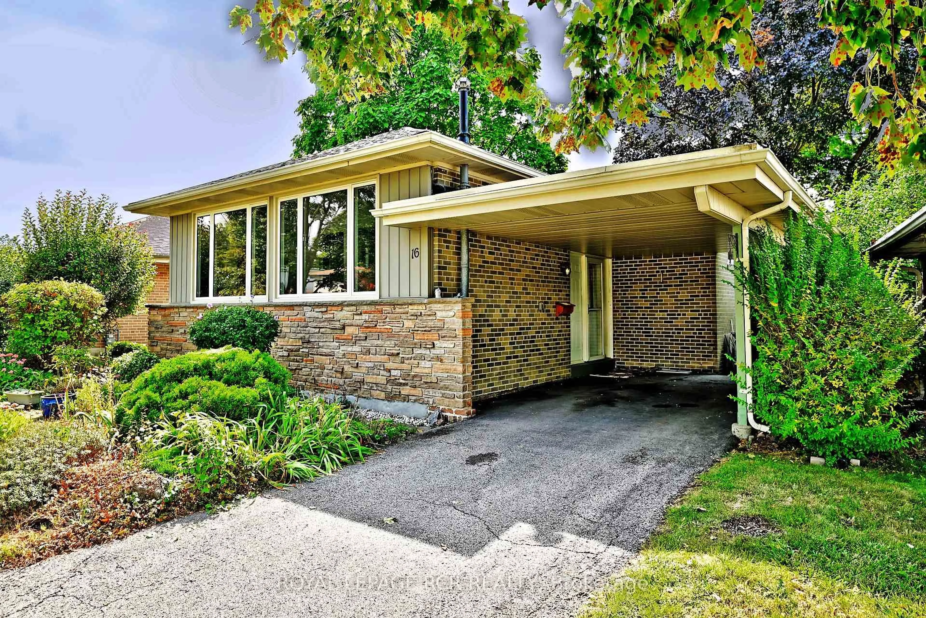Home with brick exterior material, street for 16 Cathedral Rd, Brampton Ontario L6W 2N9