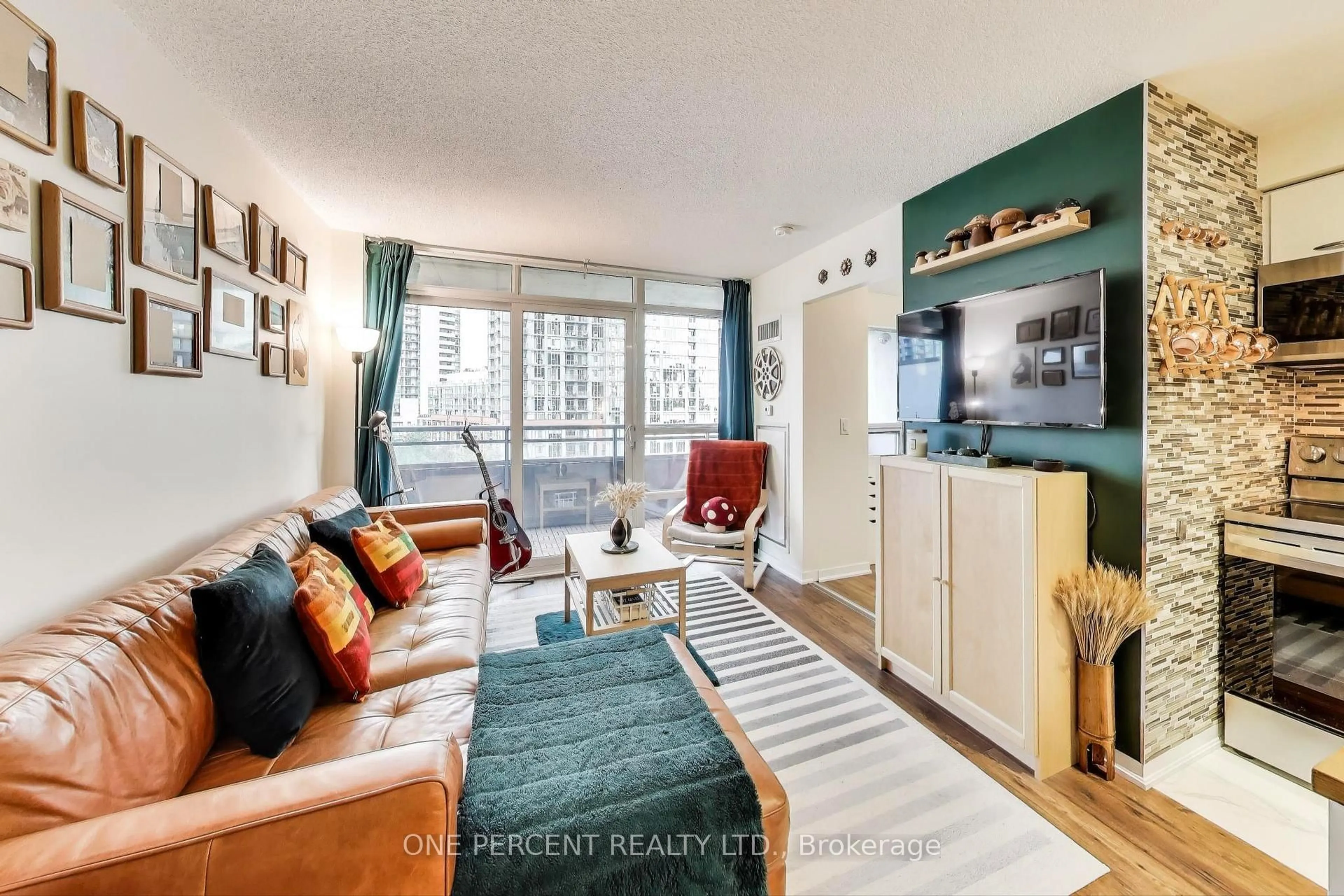 Living room with furniture, unknown for 38 Joe Shuster Way #723, Toronto Ontario M6K 0A5