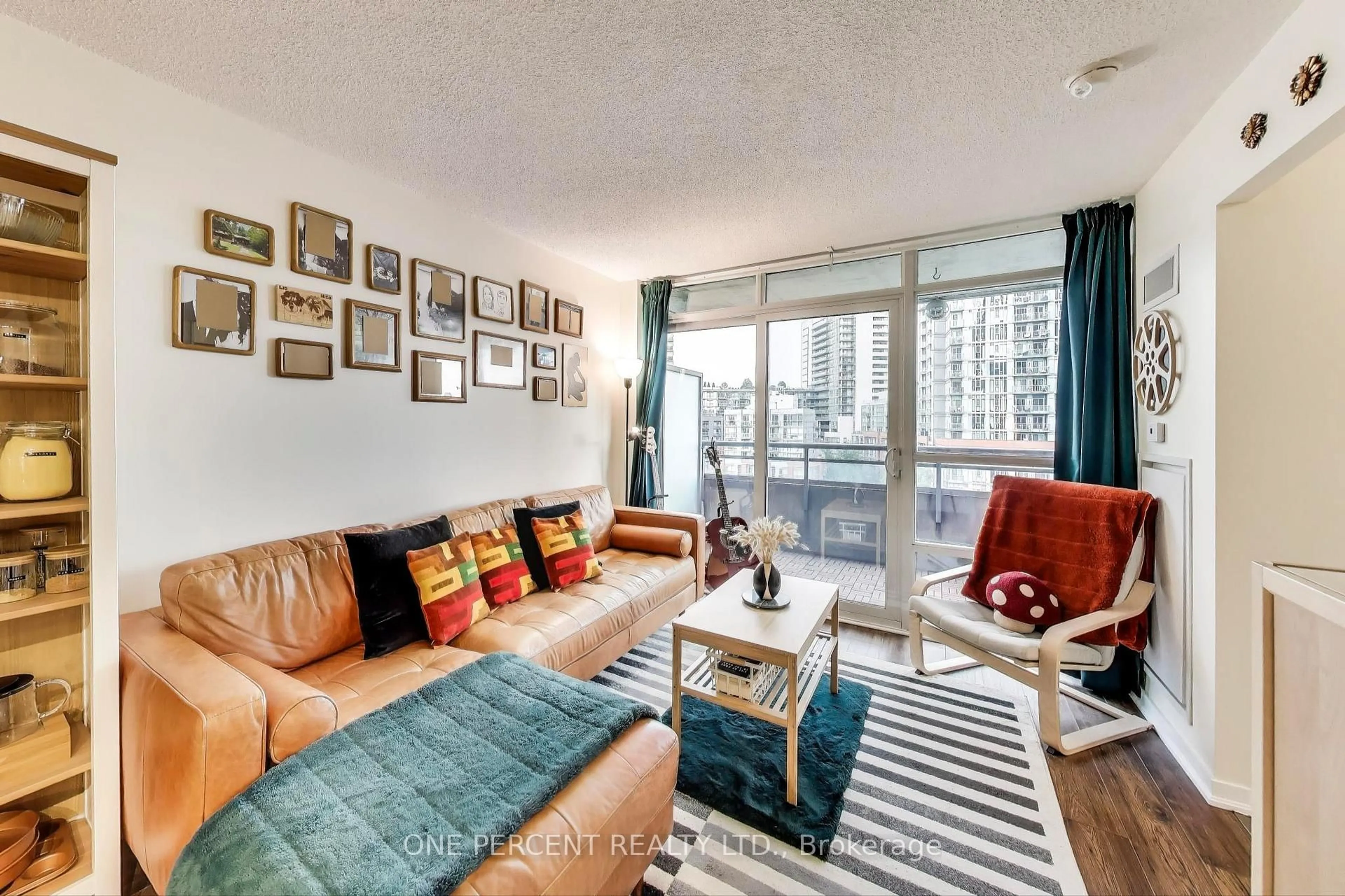 Living room with furniture, unknown for 38 Joe Shuster Way #723, Toronto Ontario M6K 0A5
