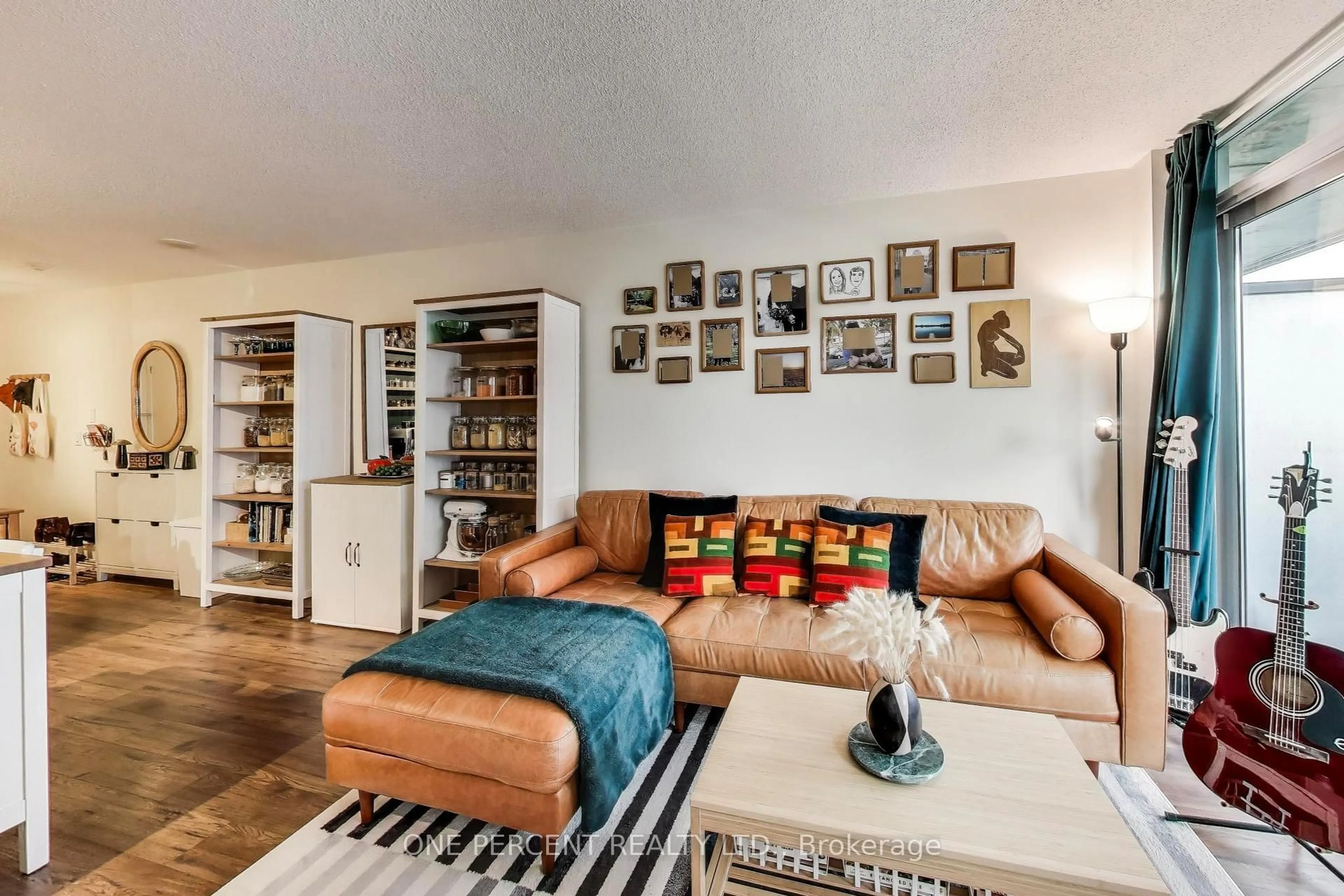 Living room with furniture, unknown for 38 Joe Shuster Way #723, Toronto Ontario M6K 0A5