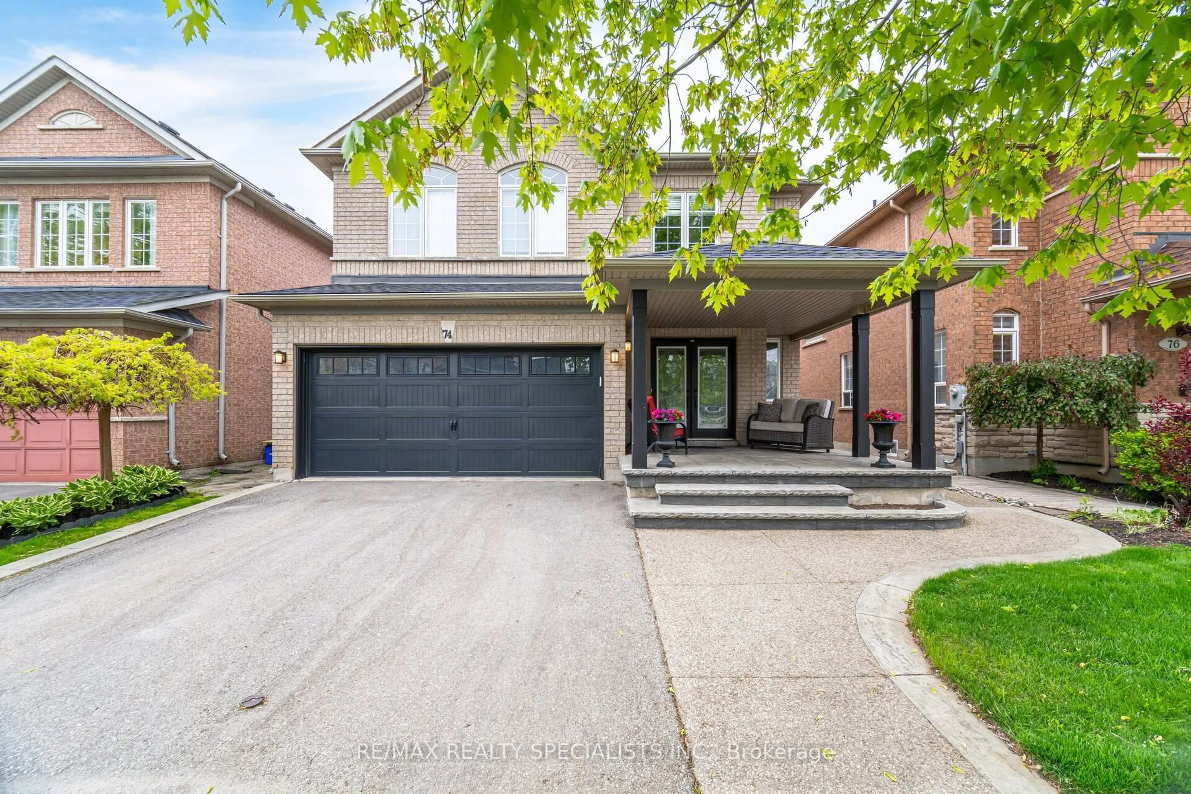 Home with brick exterior material, street for 74 Robarts Dr, Milton Ontario L9T 5P3