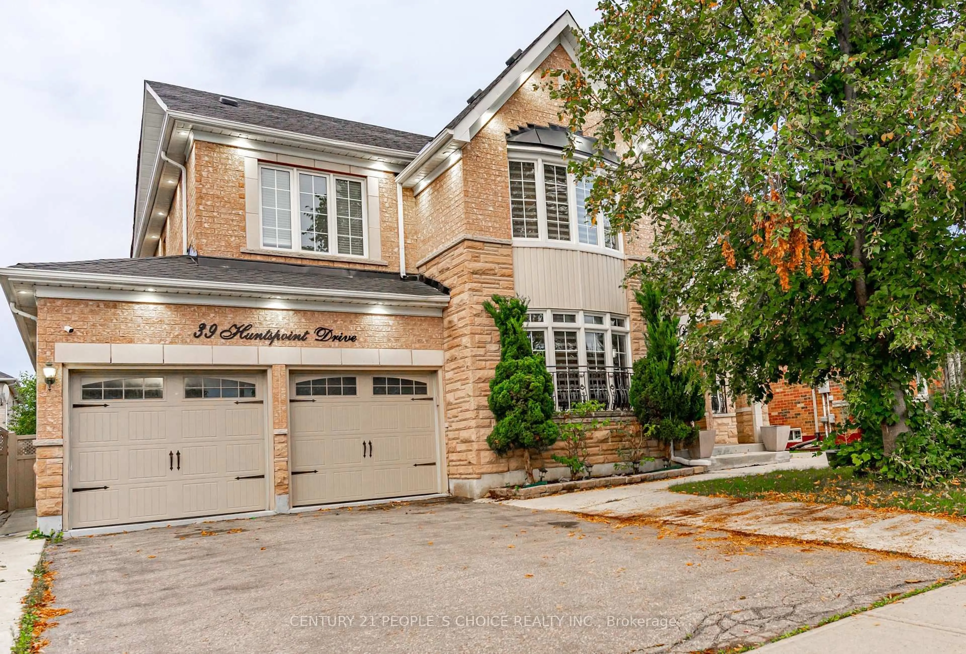Home with brick exterior material, street for 39 Huntspoint Dr, Brampton Ontario L6P 2E9