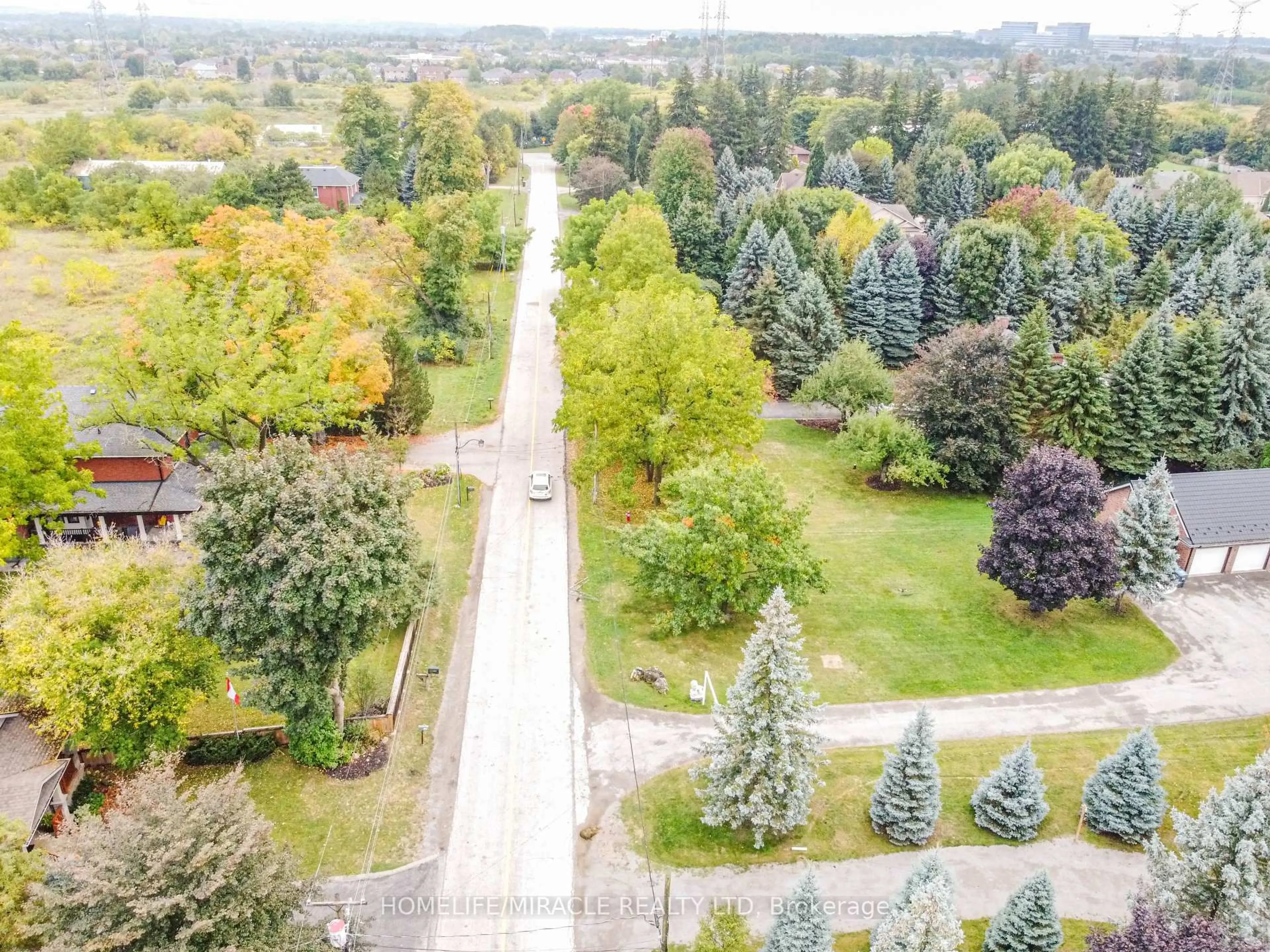 A pic from outside/outdoor area/front of a property/back of a property/a pic from drone, forest/trees view for 7596 Creditview Rd, Brampton Ontario L6Y 0G5