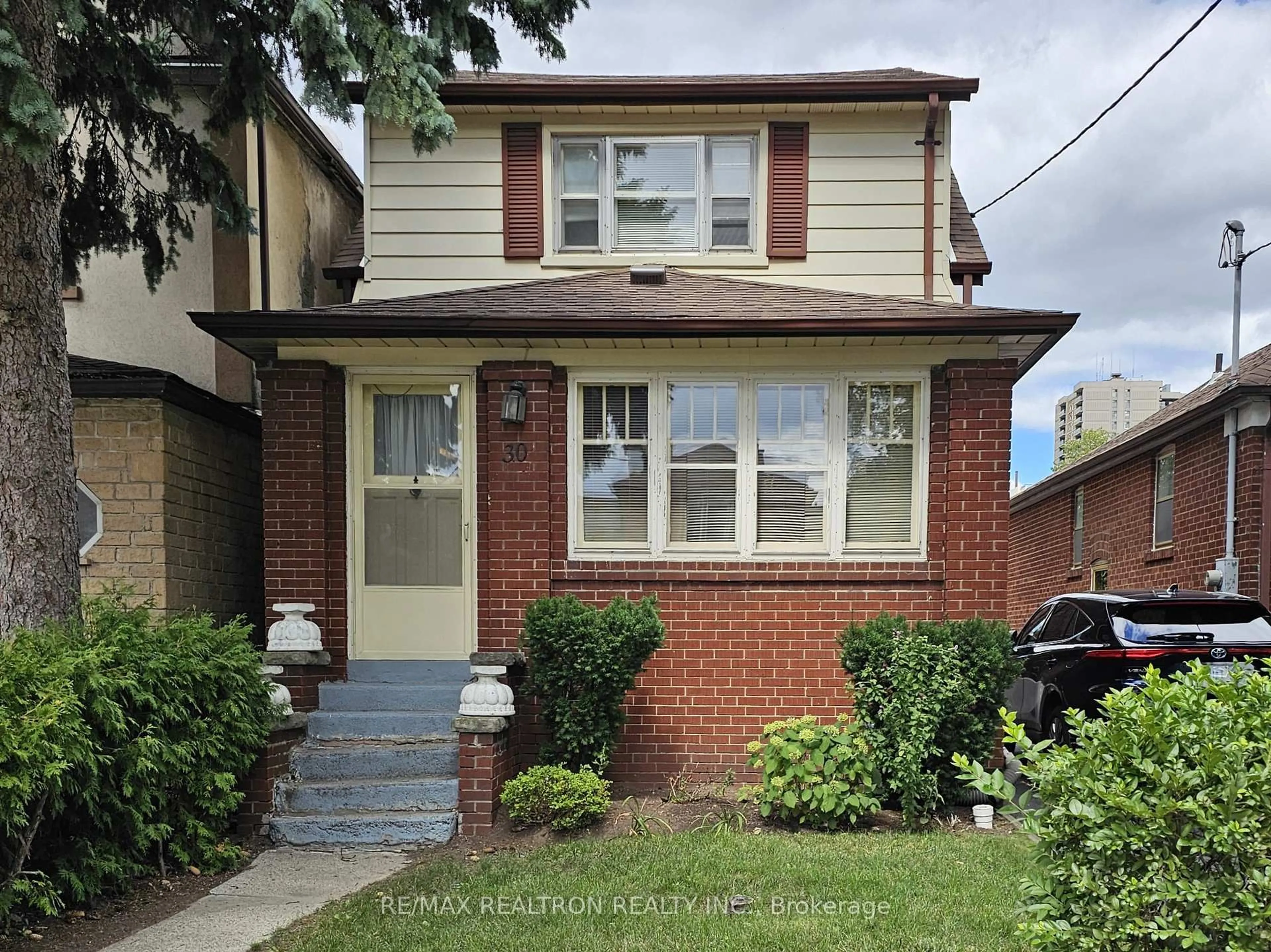 Home with brick exterior material, street for 30 Livingstone Ave, Toronto Ontario M6E 2L8