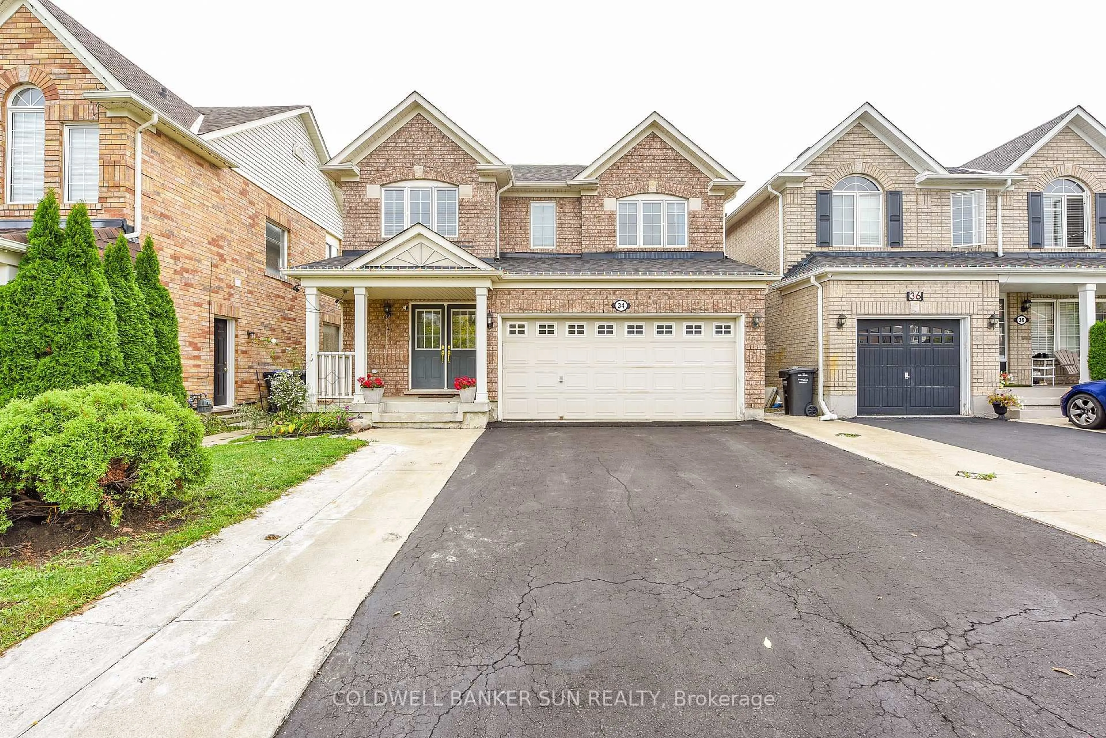 Home with brick exterior material, street for 34 Benmore Cres, Brampton Ontario L6P 2T3