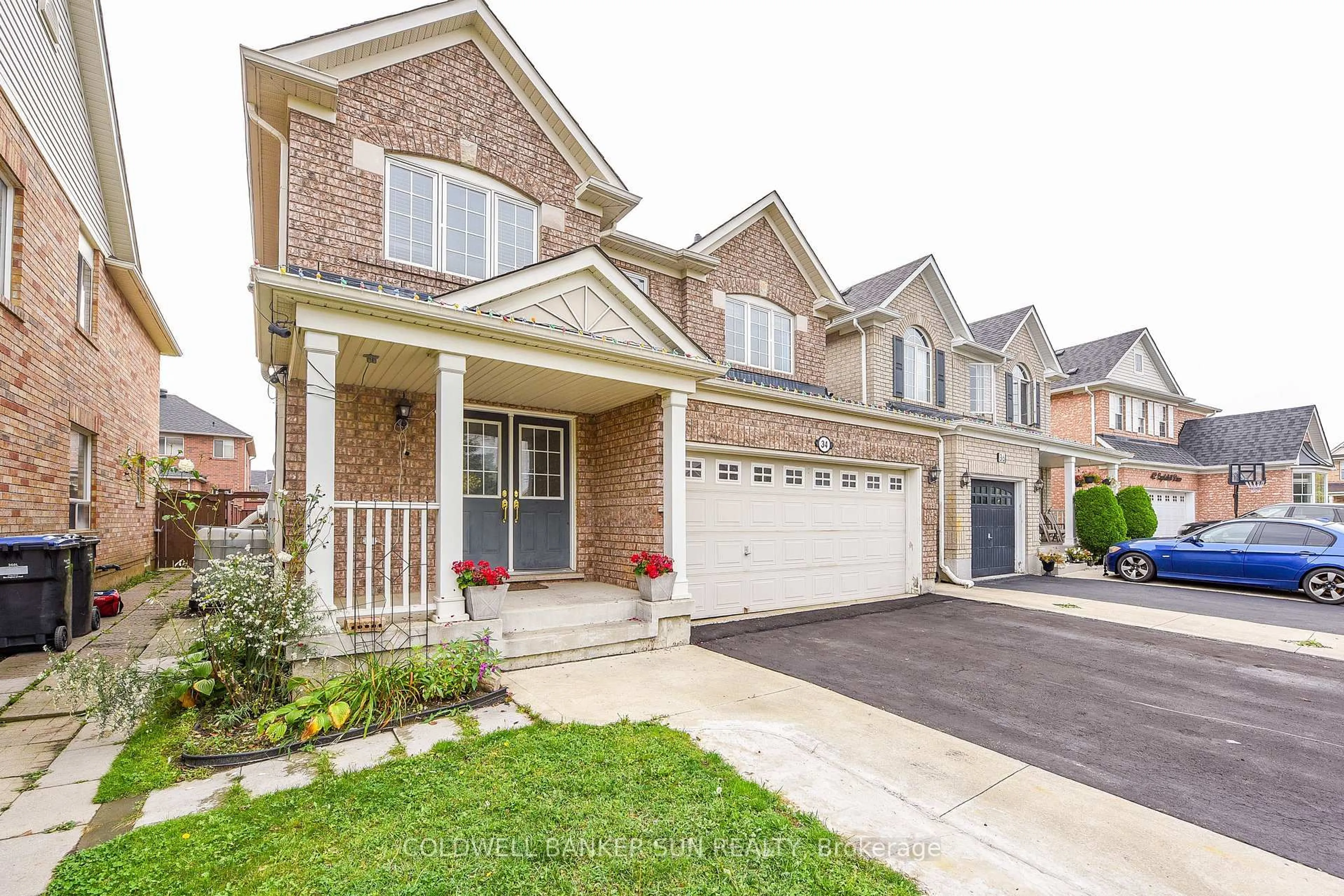 Home with brick exterior material, street for 34 Benmore Cres, Brampton Ontario L6P 2T3
