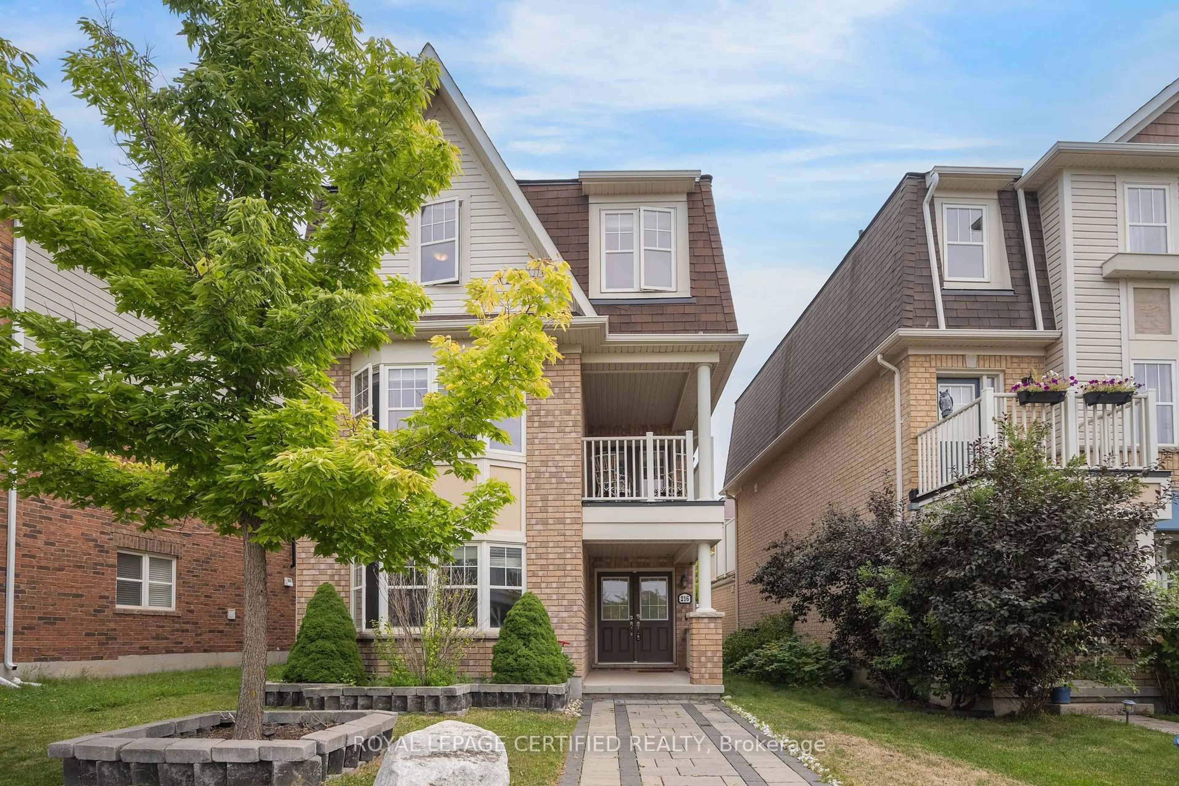 Home with brick exterior material, street for 216 Magurn Gate, Milton Ontario L9T 7B4