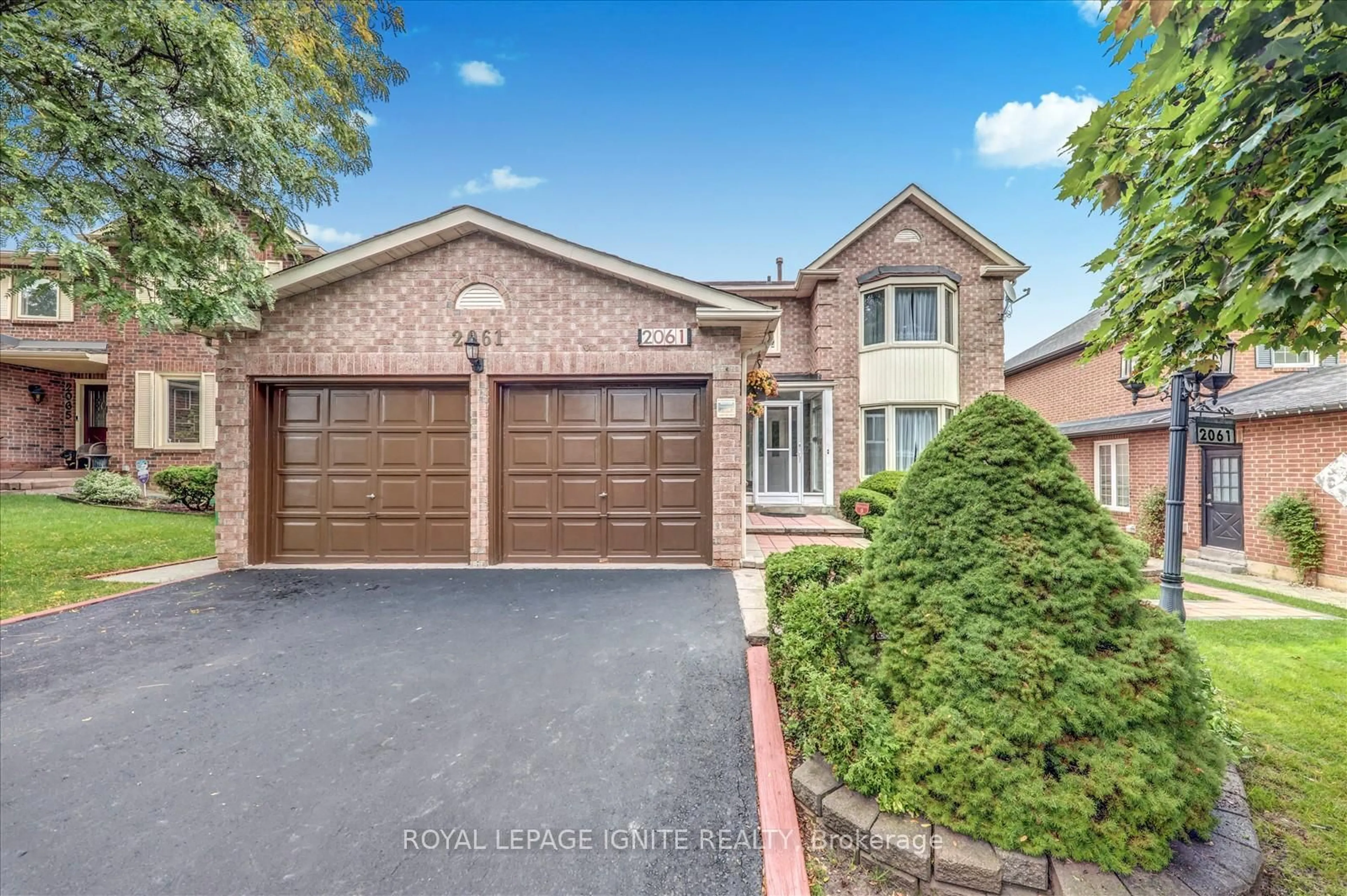 Home with brick exterior material, street for 2061 Folkway Dr, Mississauga Ontario L5L 3G3