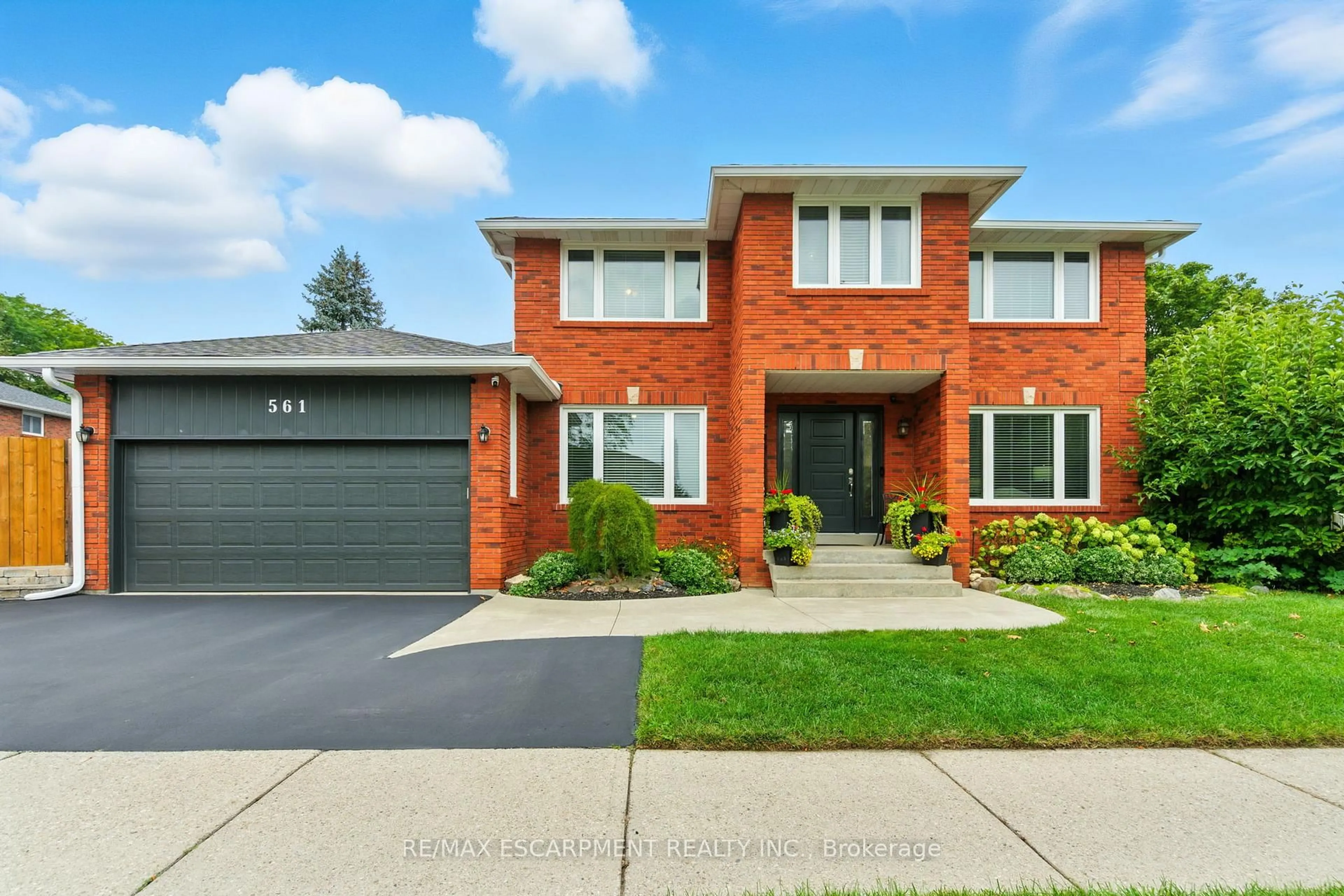 Home with brick exterior material, street for 561 Harmony Ave, Burlington Ontario L7N 3S7