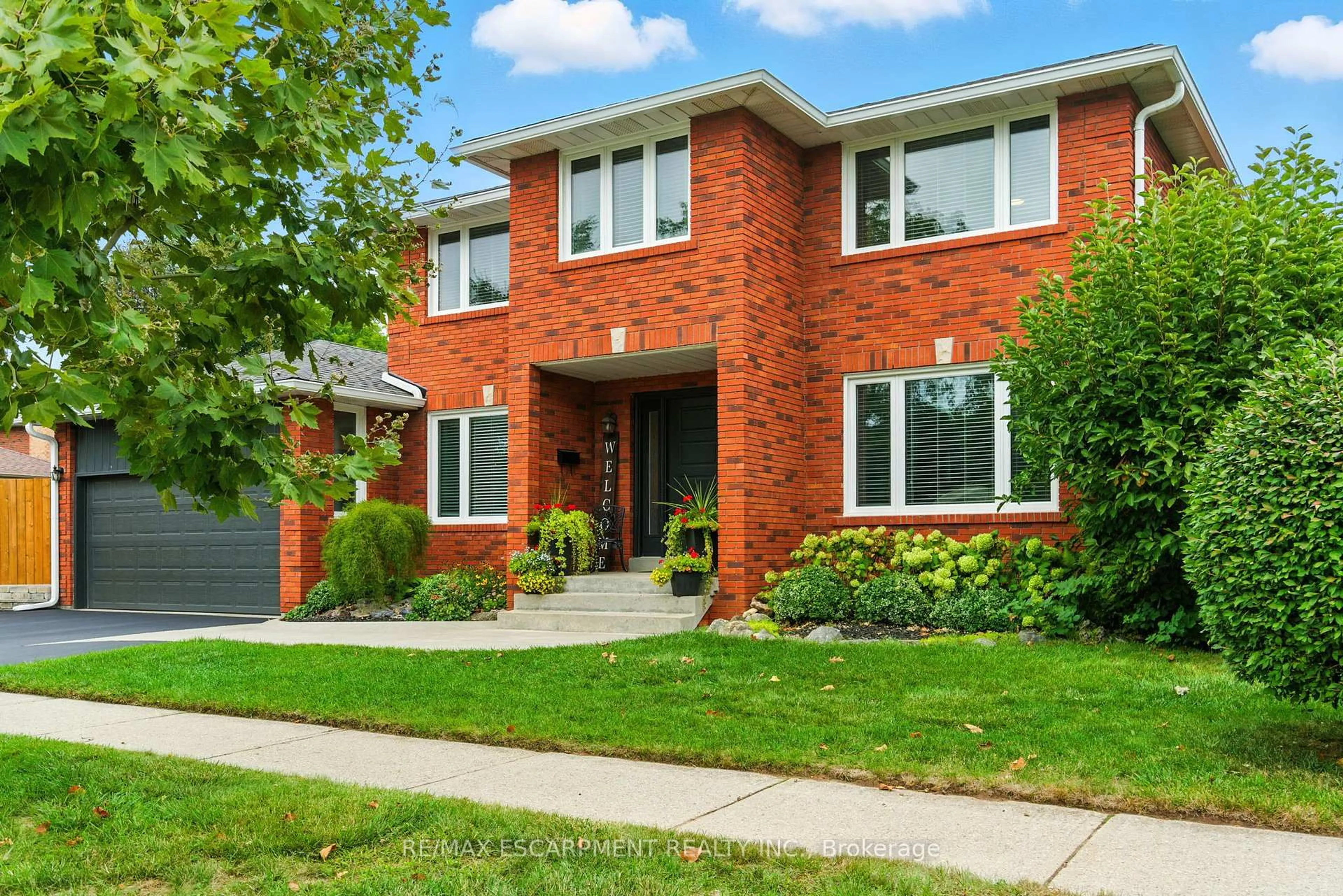 Home with brick exterior material, street for 561 Harmony Ave, Burlington Ontario L7N 3S7