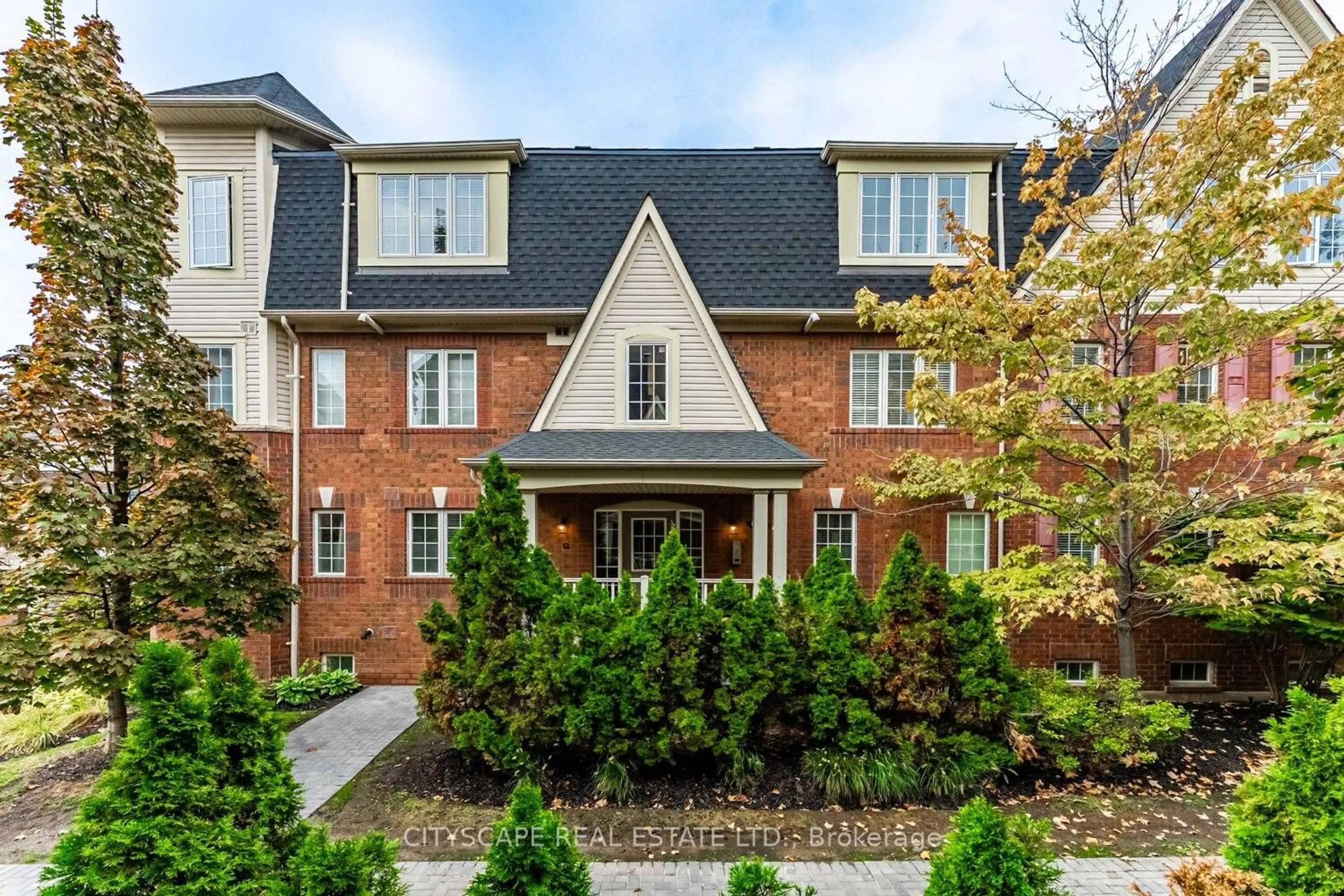 Home with brick exterior material, street for 700 Neighbourhood Circ #3, Mississauga Ontario L5B 0A6