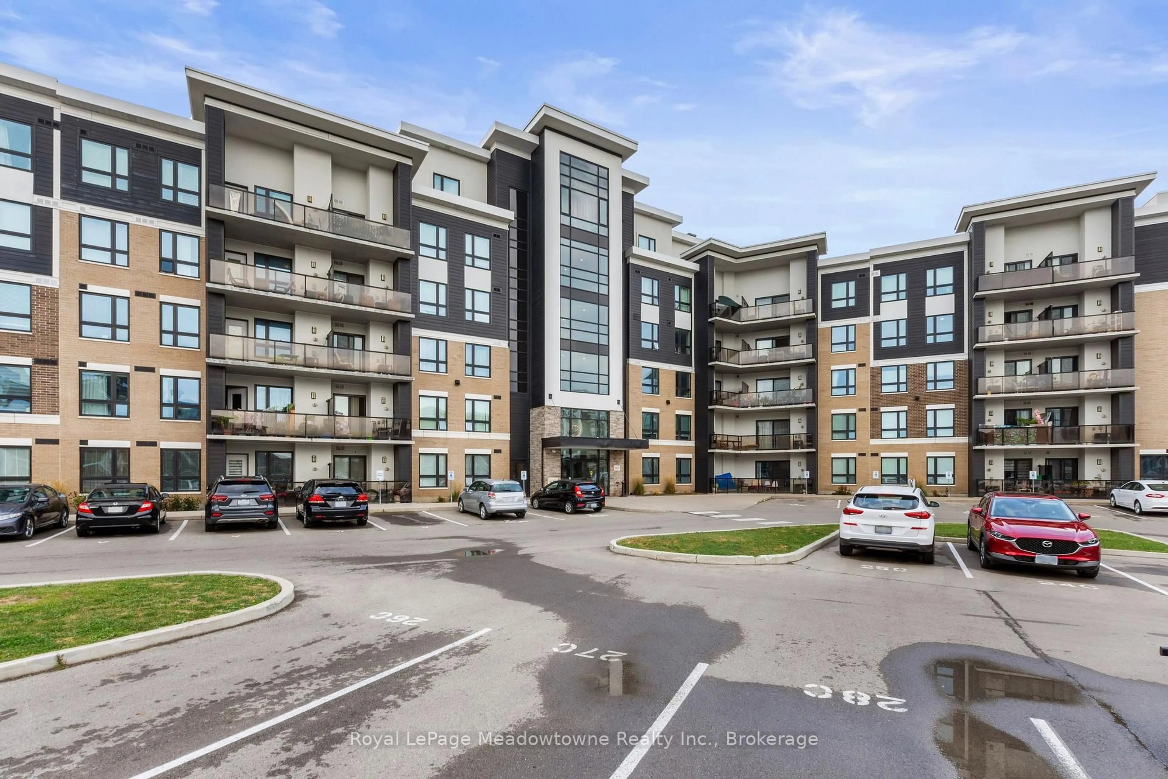 A pic from outside/outdoor area/front of a property/back of a property/a pic from drone, unknown for 630 Sauve St #511, Milton Ontario L9T 9A6