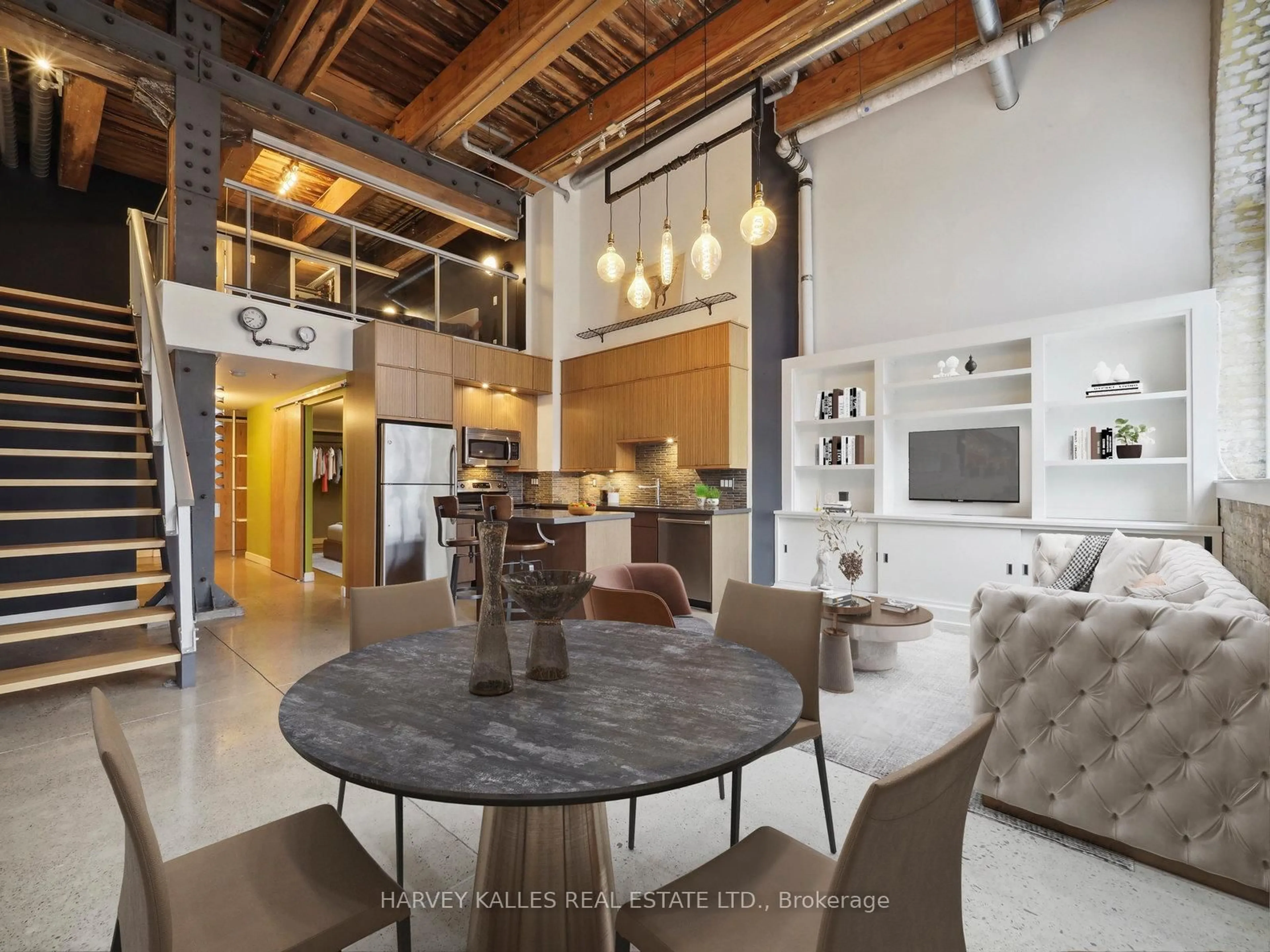 Open concept kitchen, cement floor for 363 Sorauren Ave #110, Toronto Ontario M6R 3C1