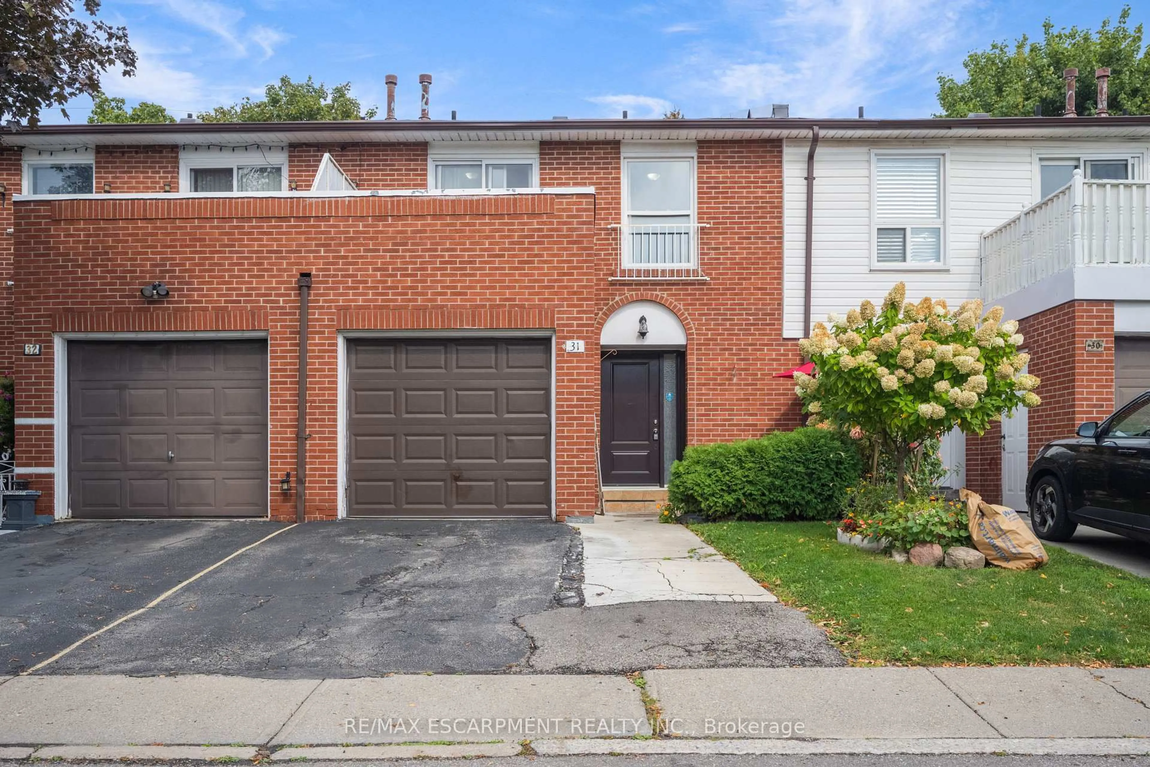 Home with brick exterior material, street for 3430 Brandon Gate Dr #31, Mississauga Ontario L4T 3T4