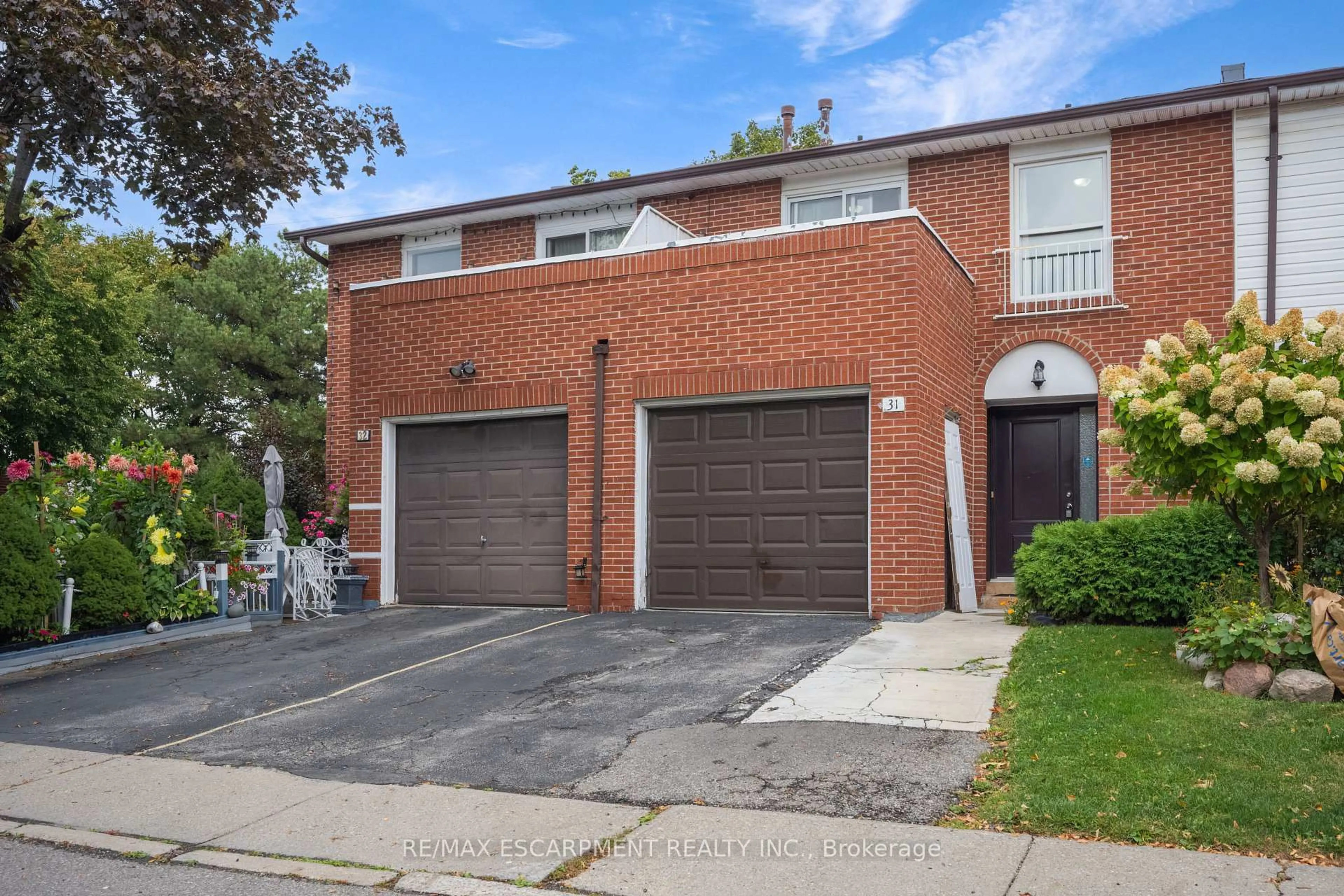 Home with brick exterior material, street for 3430 Brandon Gate Dr #31, Mississauga Ontario L4T 3T4