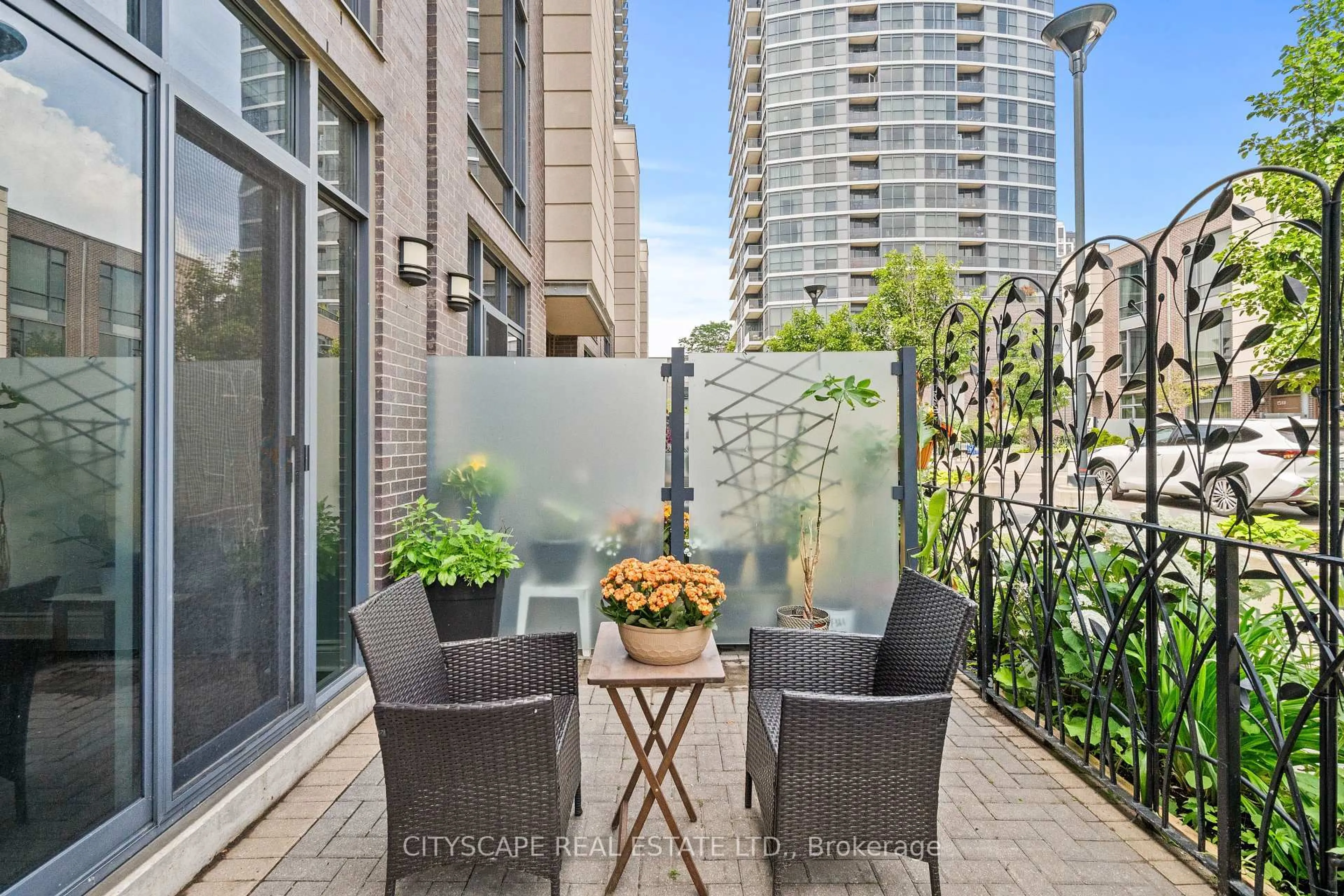 Patio, city buildings view from balcony for 23 Valhalla Inn Rd #50, Toronto Ontario M9B 1S9