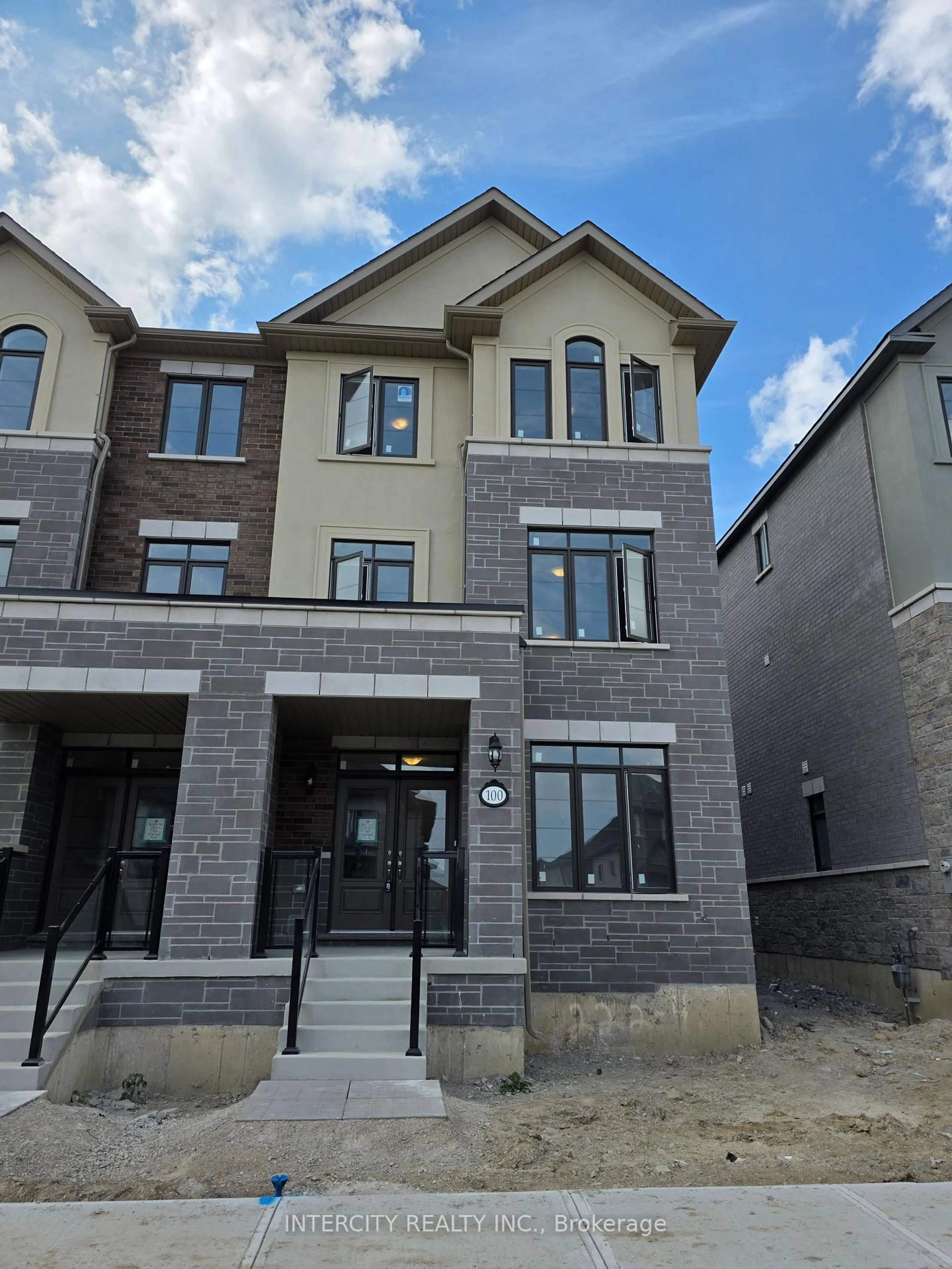 Home with brick exterior material, street for 100 Grassbank Rd, Brampton Ontario L6R 4E7