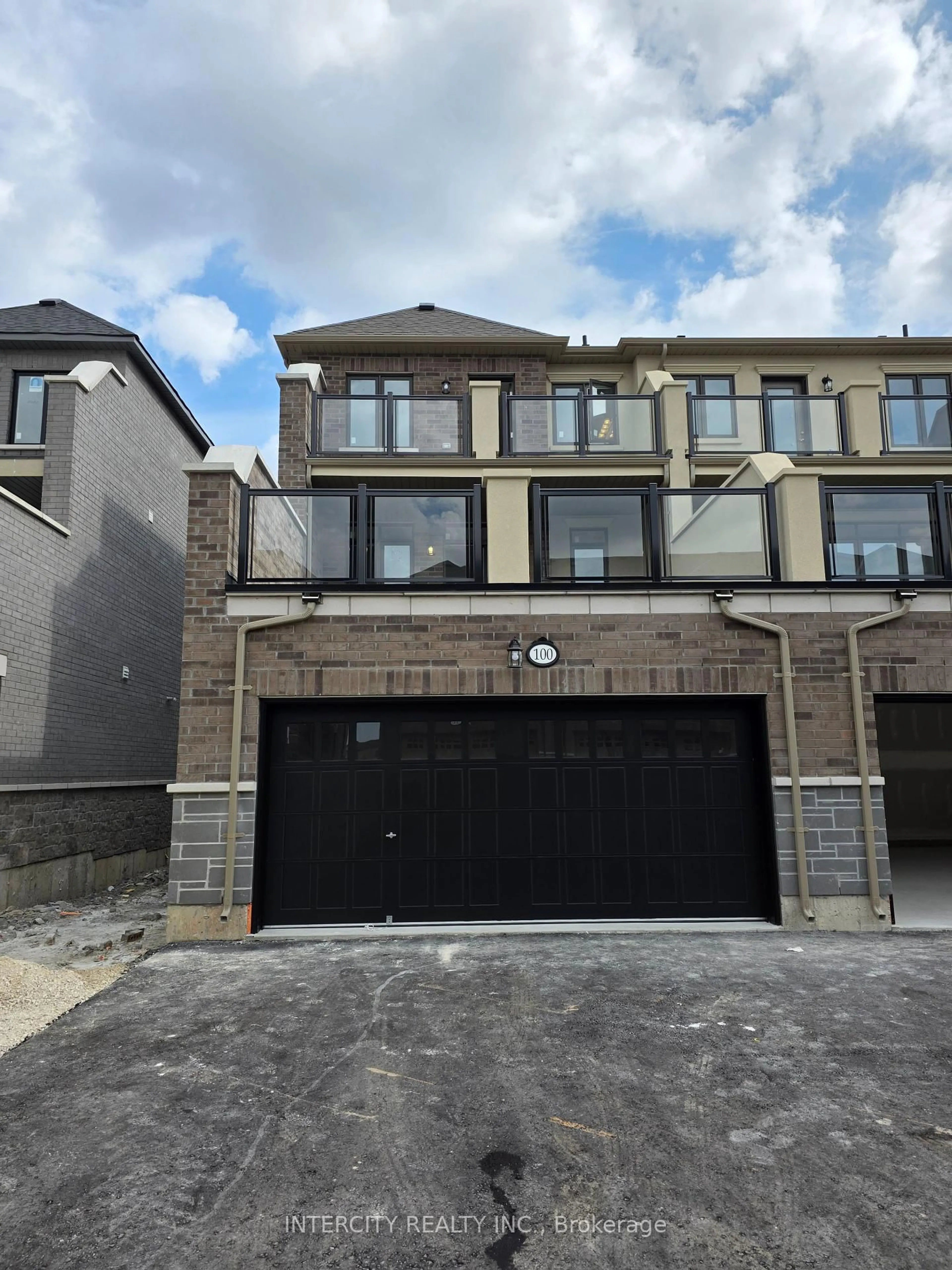 Home with brick exterior material, street for 100 Grassbank Rd, Brampton Ontario L6R 4E7