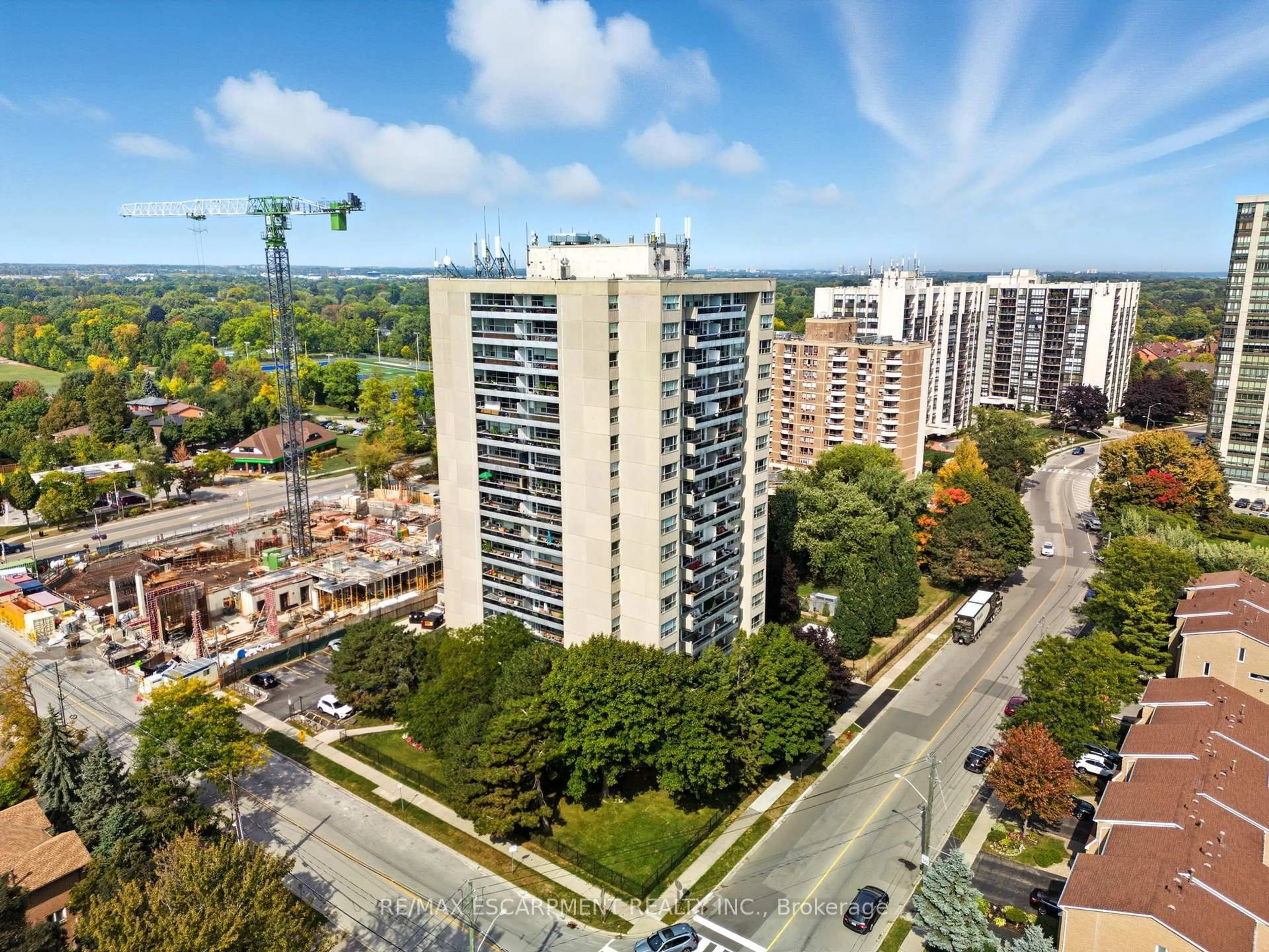 A pic from outside/outdoor area/front of a property/back of a property/a pic from drone, city buildings view from balcony for 2263 Marine Dr #305, Oakville Ontario L6L 5K1