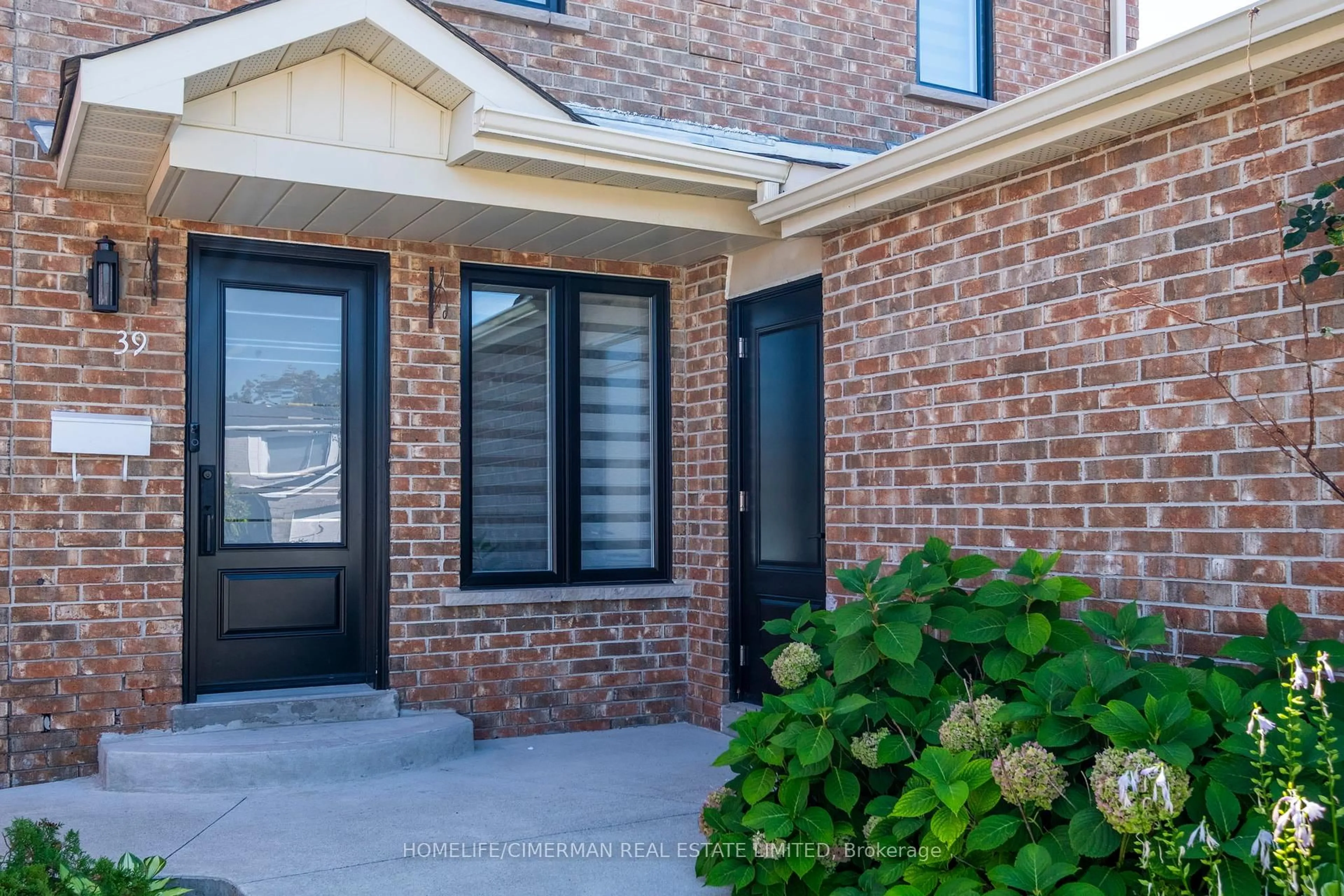 Home with brick exterior material, street for 39 Stanwell Dr, Brampton Ontario L6Z 3Y8