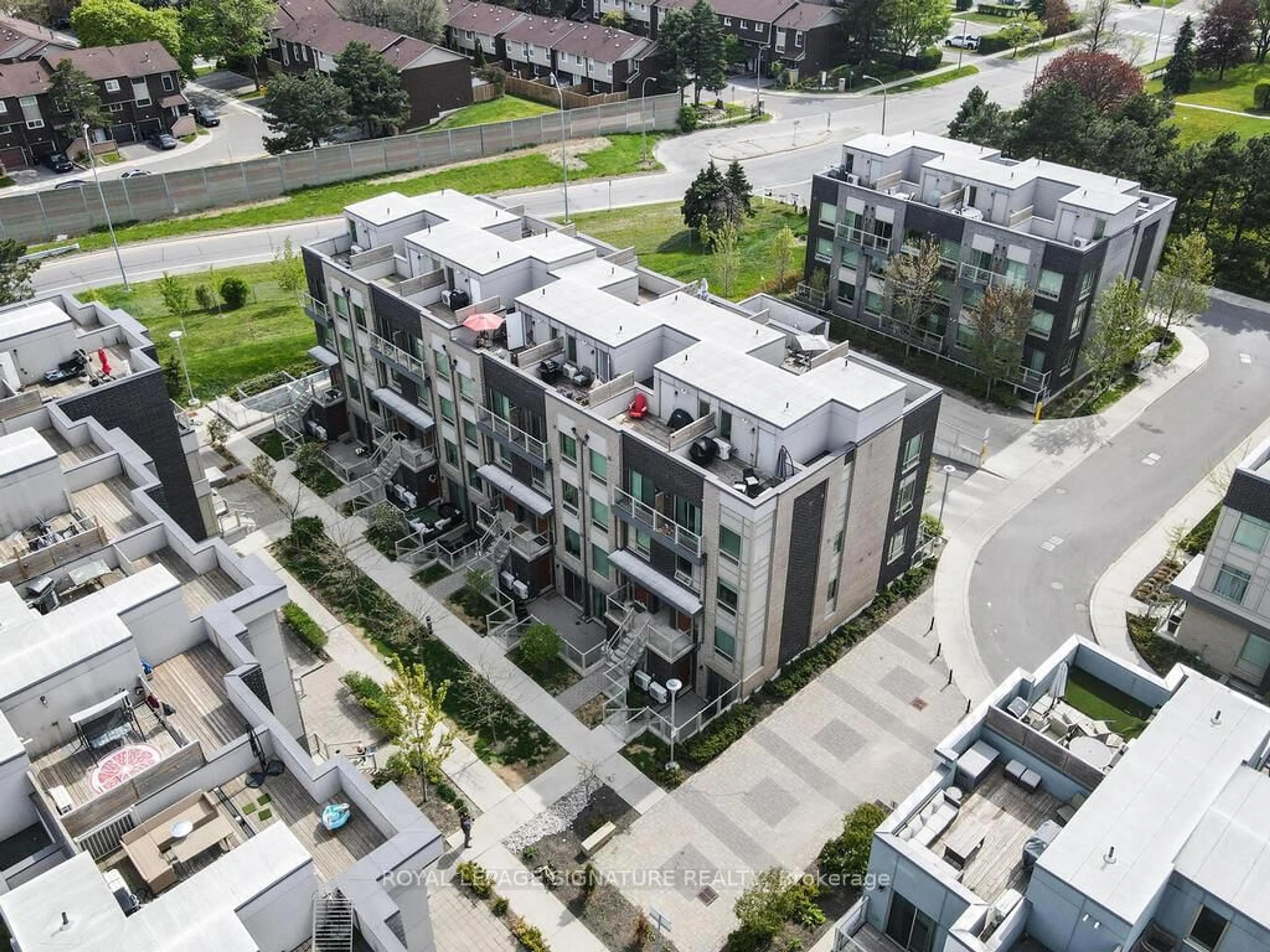 A pic from outside/outdoor area/front of a property/back of a property/a pic from drone, unknown for 7 Applewood Lane #232, Toronto Ontario M9C 2Z7