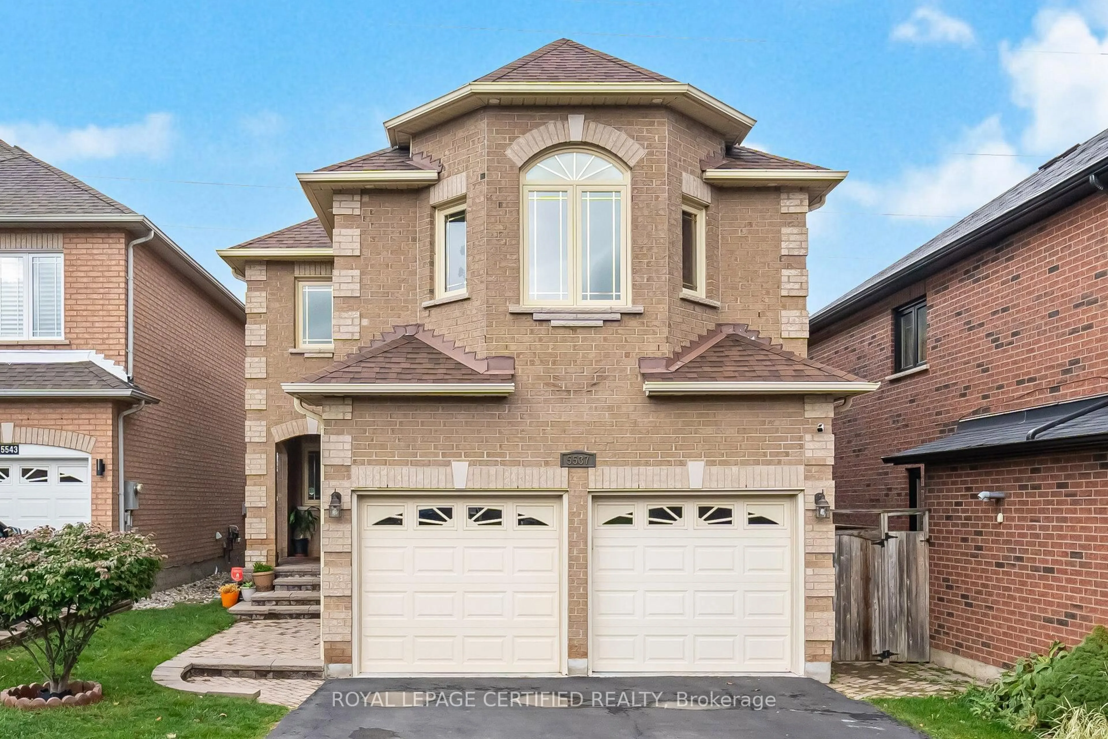 Home with brick exterior material, street for 5537 Wilderness Tr, Mississauga Ontario L4Z 4A6