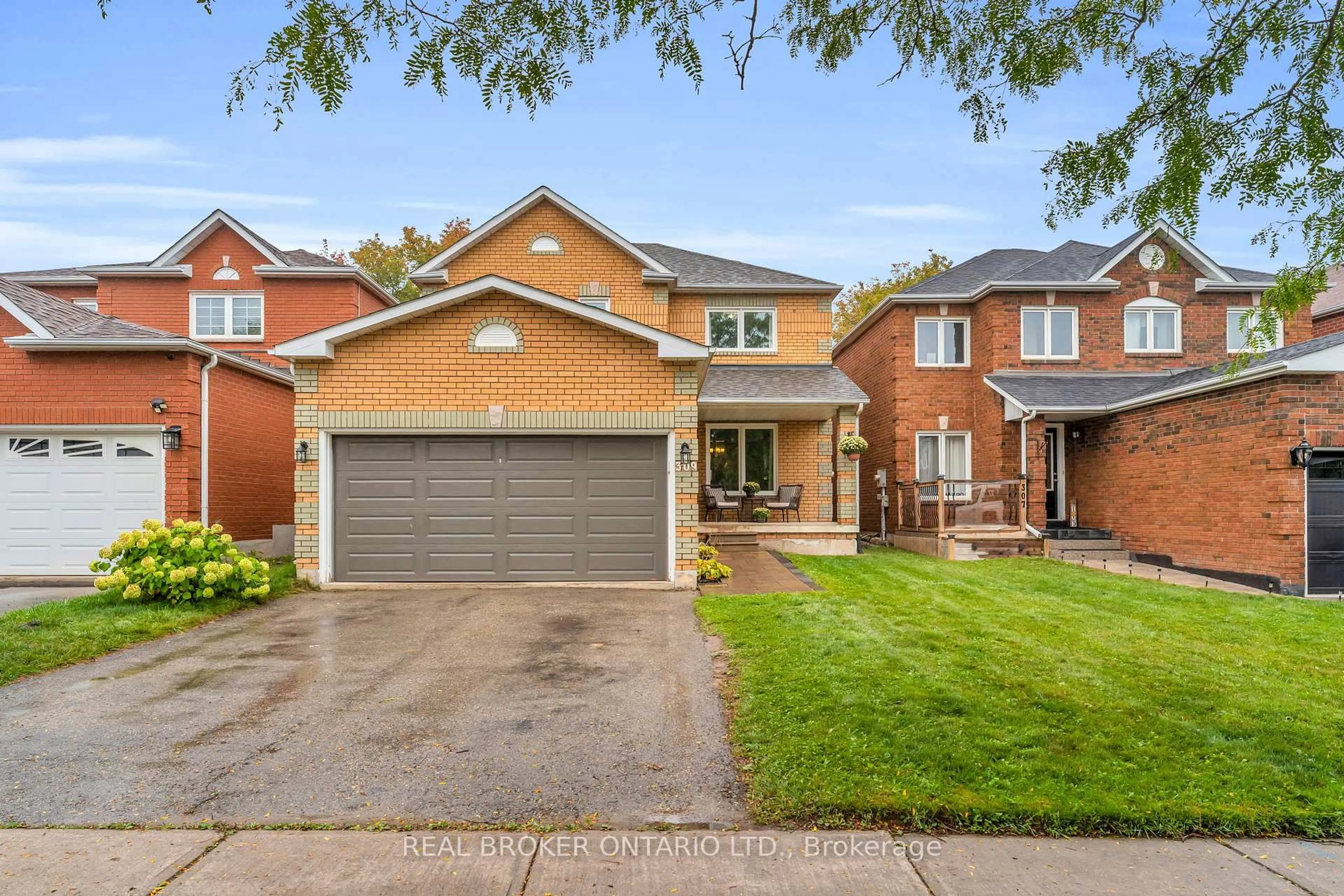 Home with brick exterior material, street for 309 Howard Cres, Orangeville Ontario L9W 4Y3