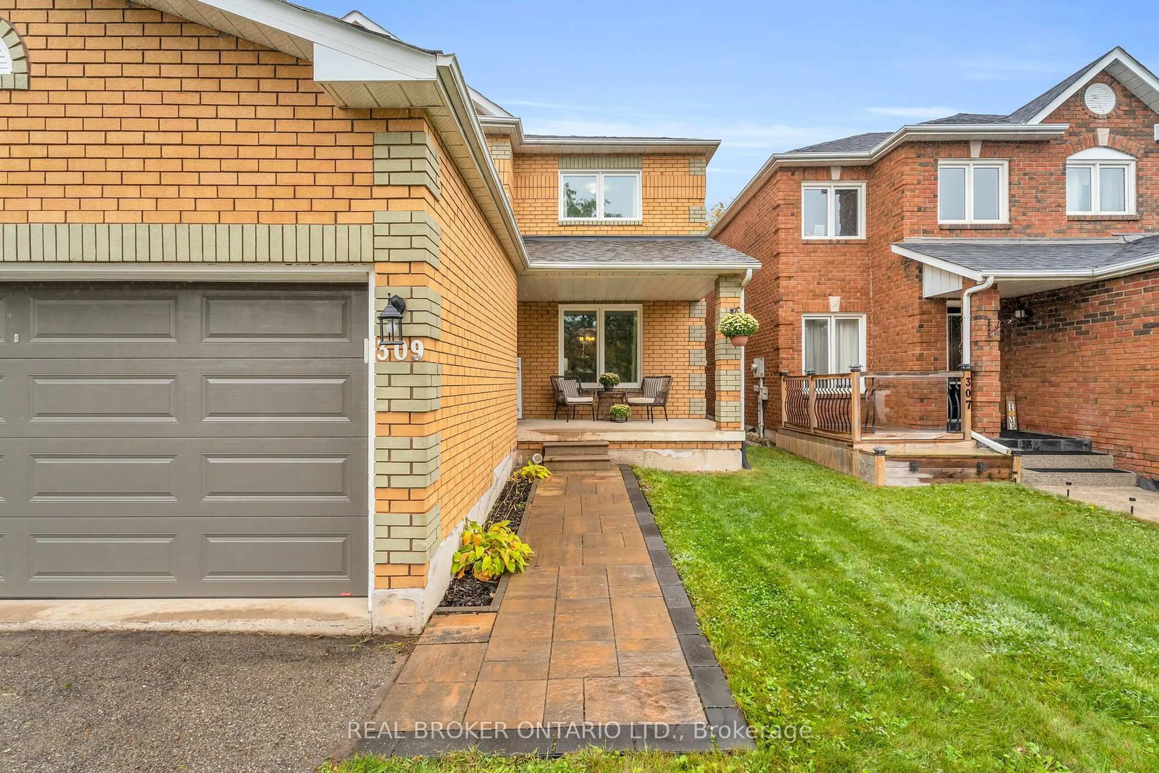 Home with brick exterior material, street for 309 Howard Cres, Orangeville Ontario L9W 4Y3